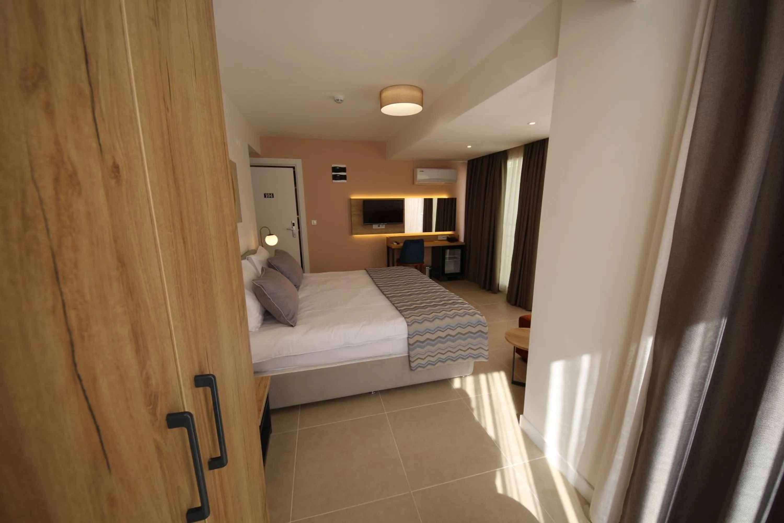 Bed in SPİLOS GÜMÜLDÜR HOTEL