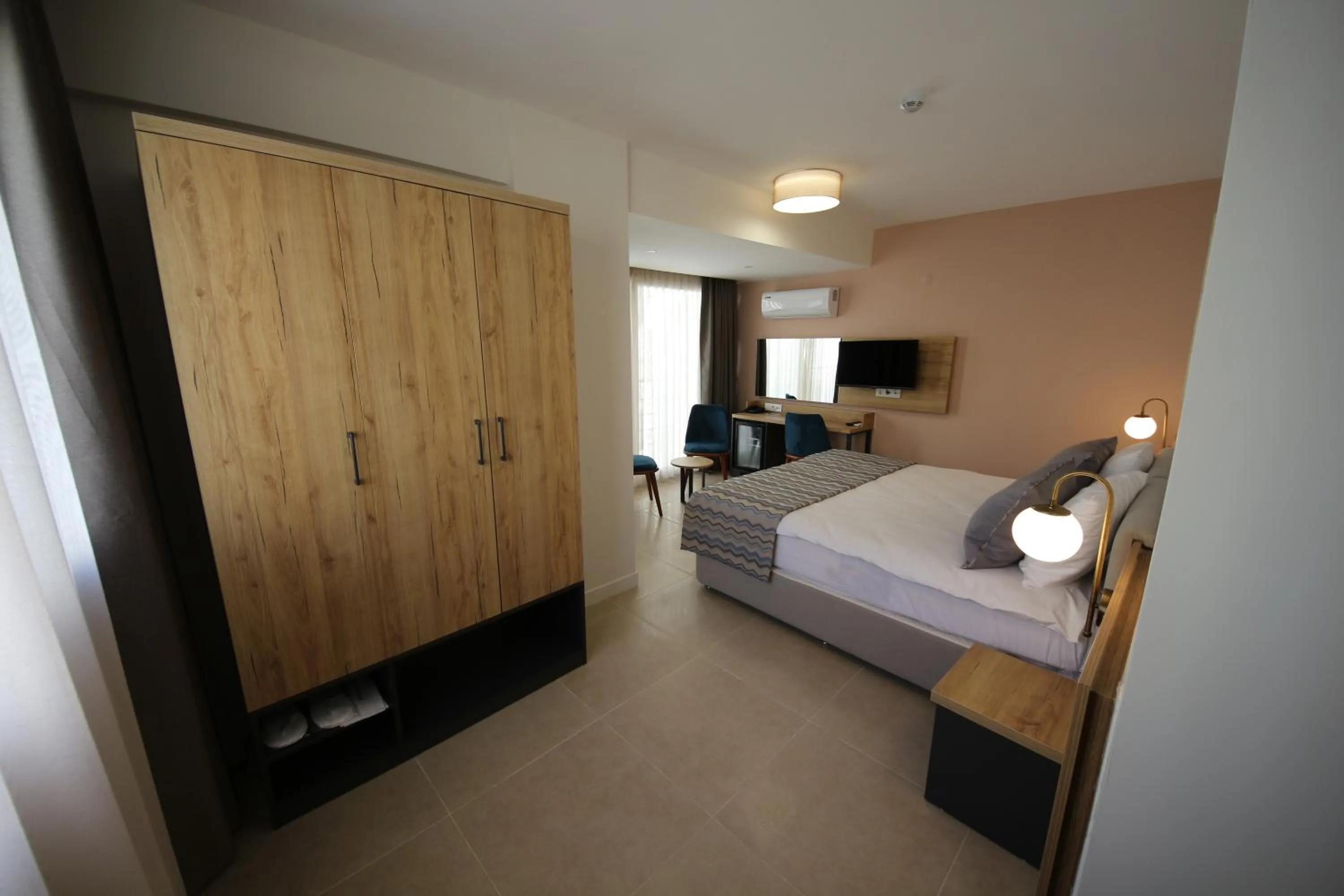 Bed in SPİLOS GÜMÜLDÜR HOTEL