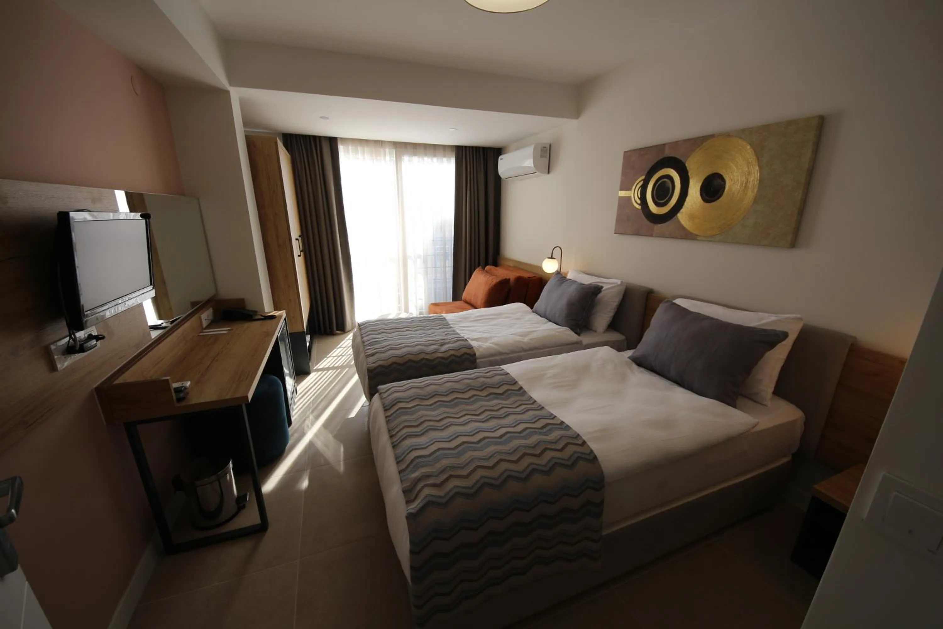 Bed in SPİLOS GÜMÜLDÜR HOTEL