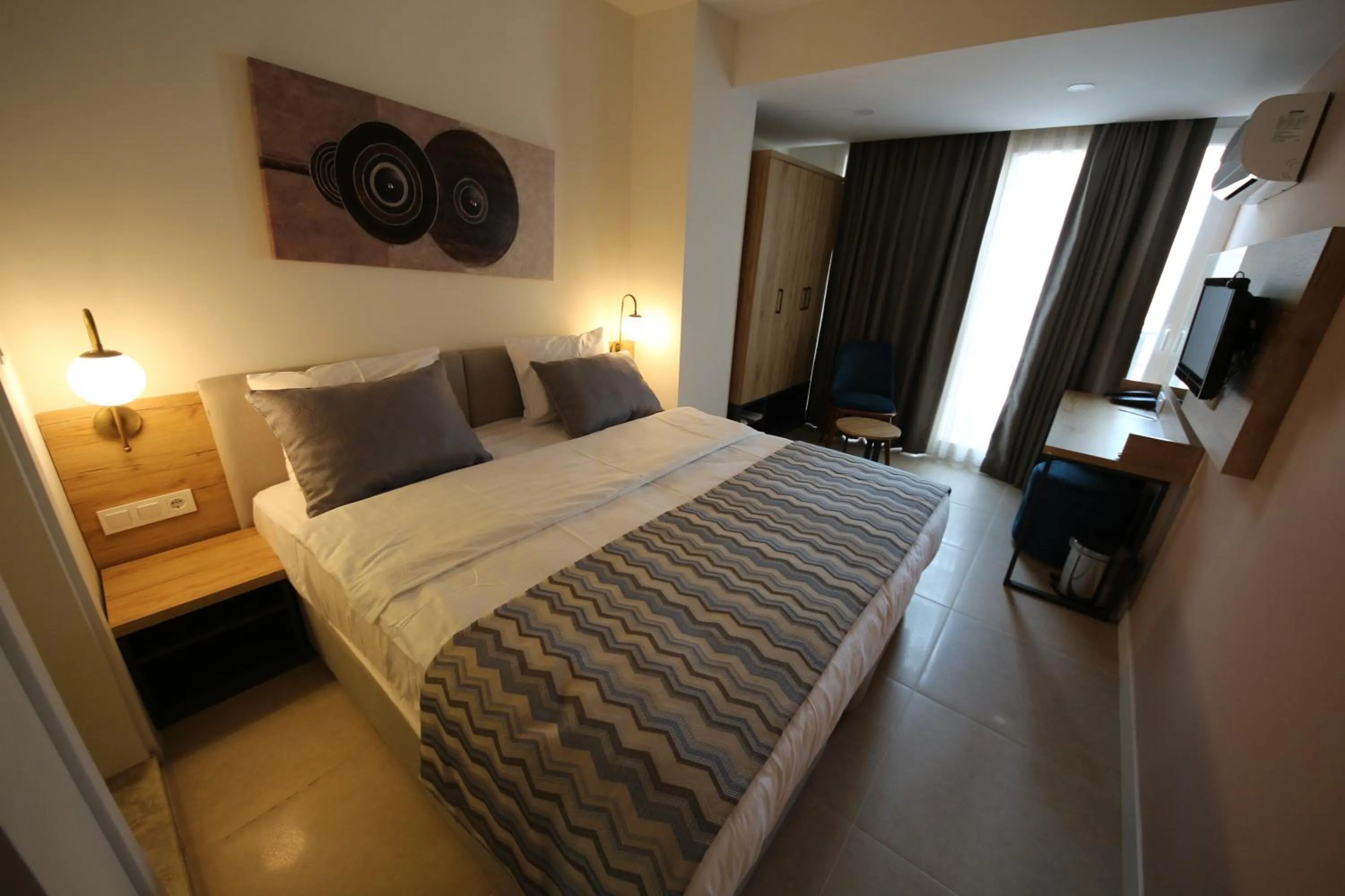 Bed in SPİLOS GÜMÜLDÜR HOTEL
