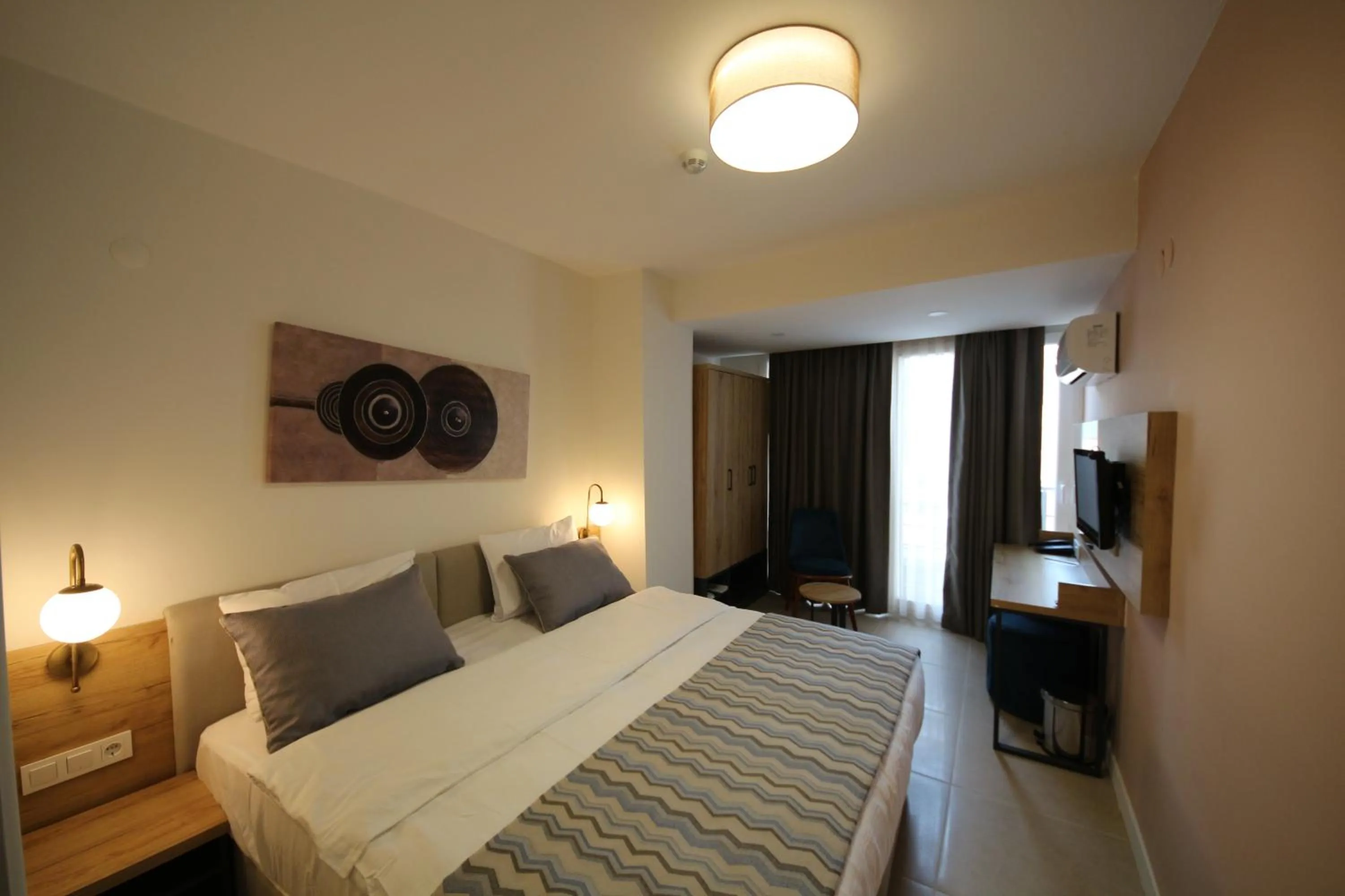 Bed in SPİLOS GÜMÜLDÜR HOTEL