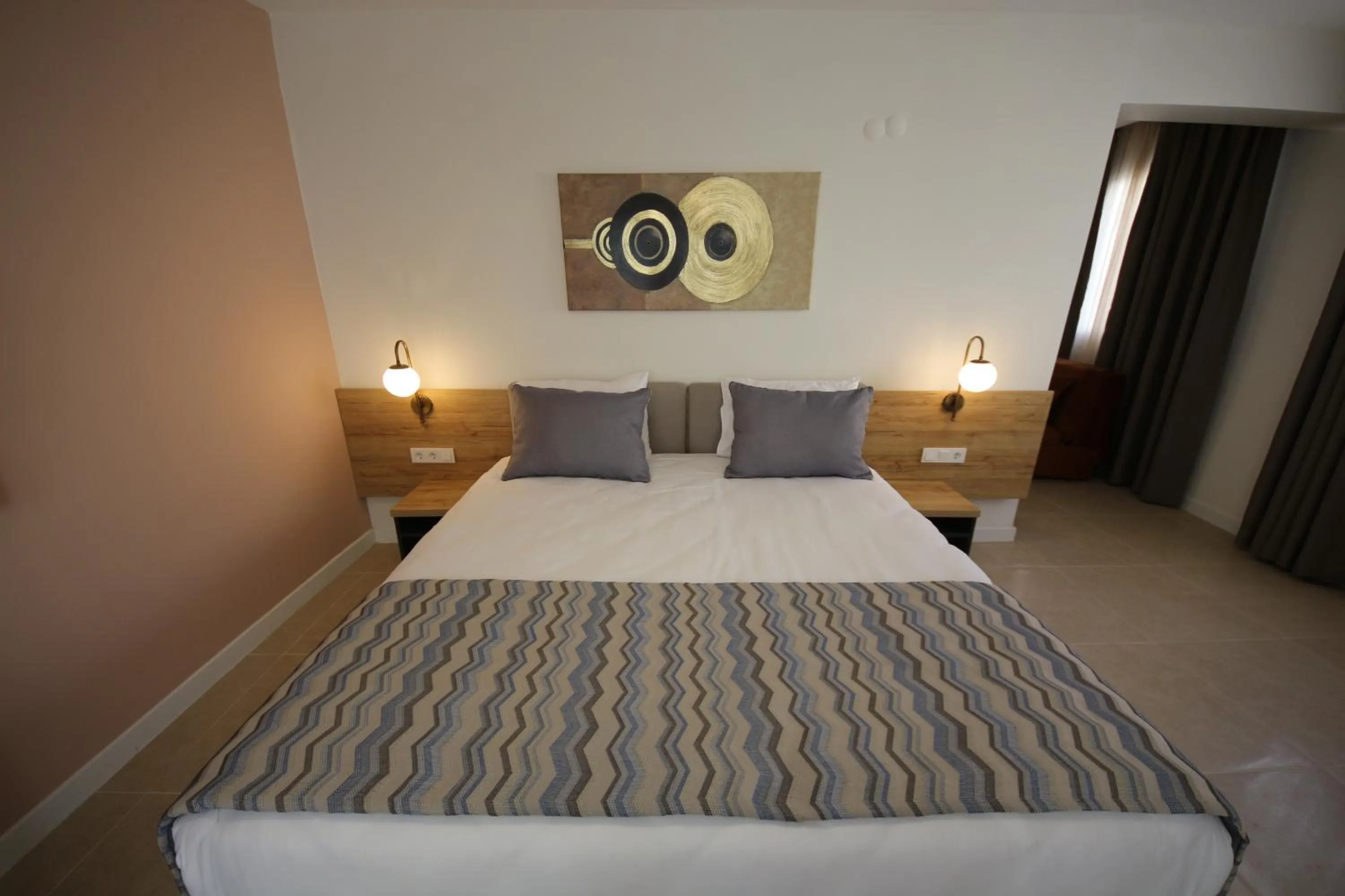 Bed in SPİLOS GÜMÜLDÜR HOTEL