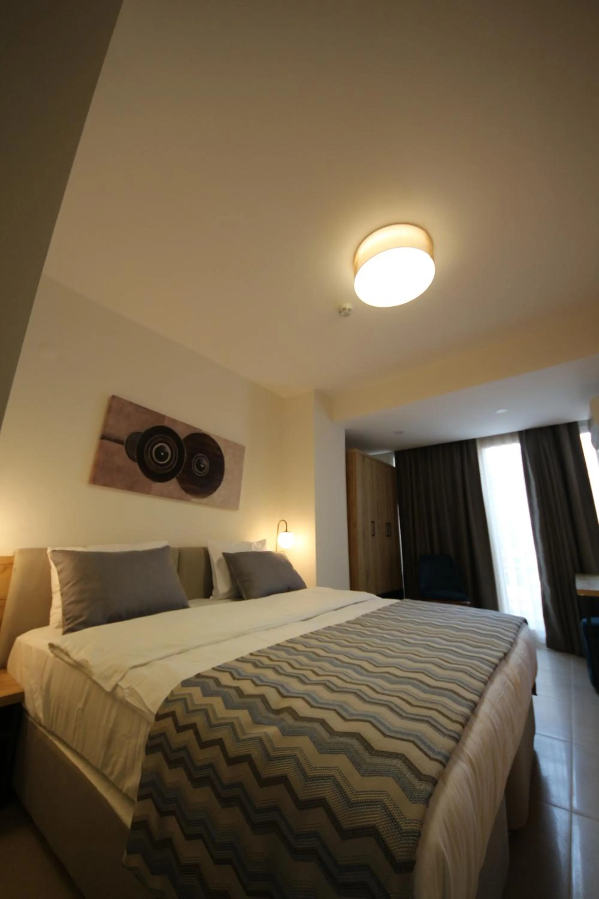 Bed in SPİLOS GÜMÜLDÜR HOTEL