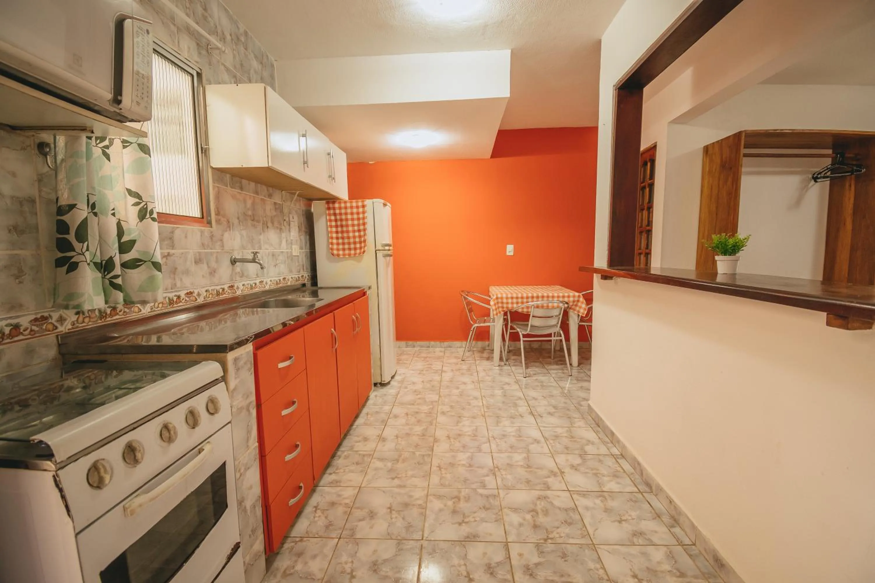 Kitchen or kitchenette in Pousada Porto Amazônia