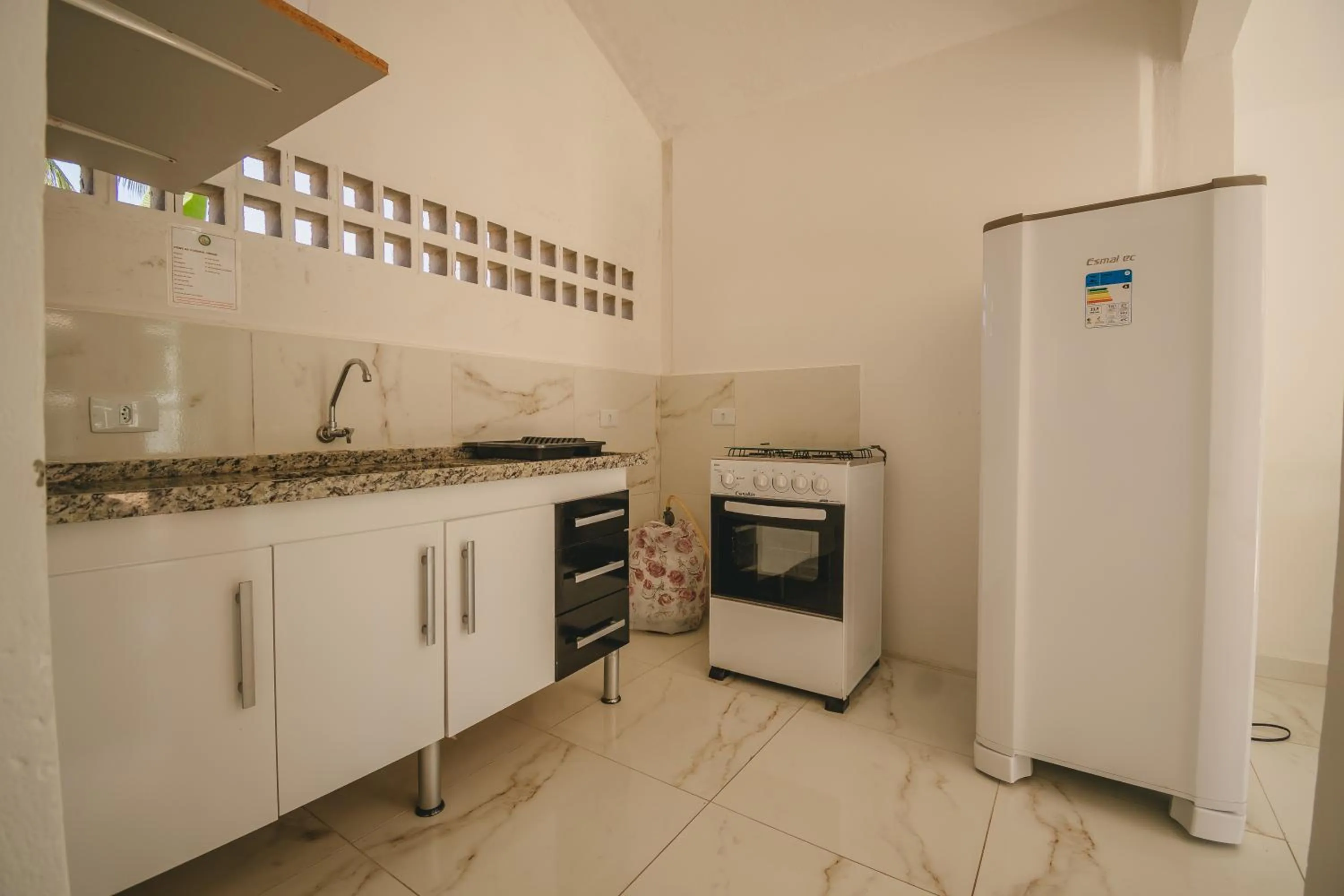Kitchen or kitchenette in Pousada Porto Amazônia