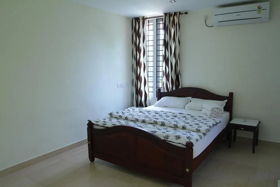 Bed in Fortbeach Service Apartments