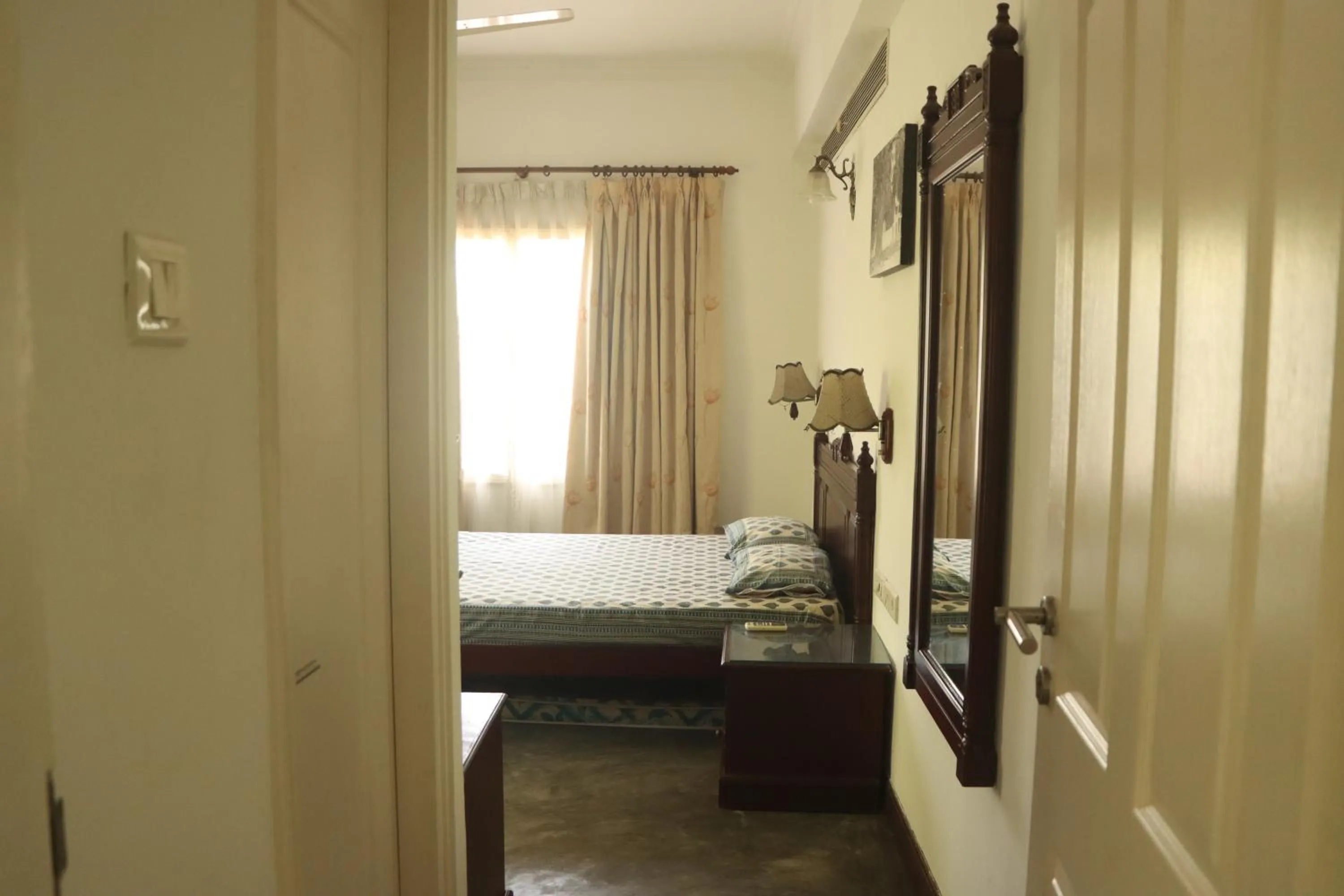 Bed in Fortbeach Service Apartments