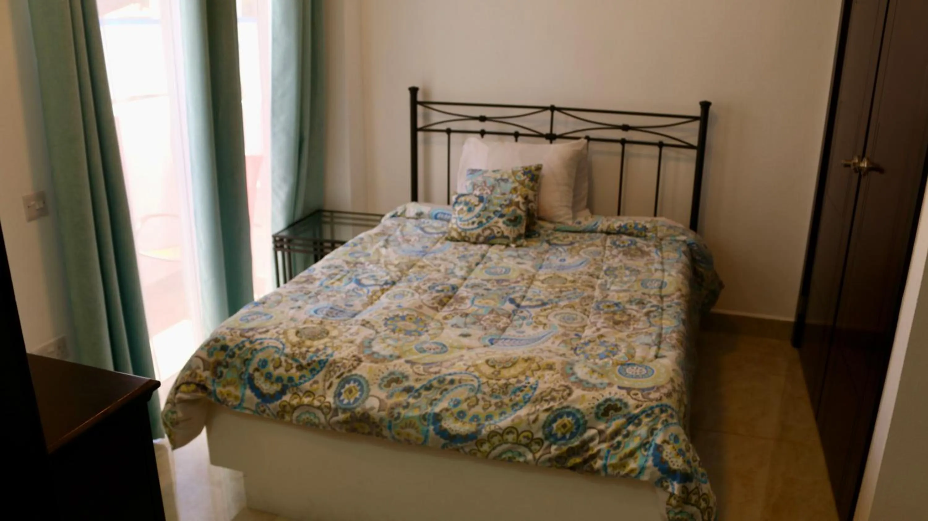 Bed in Blue Star Apartments & Hotel