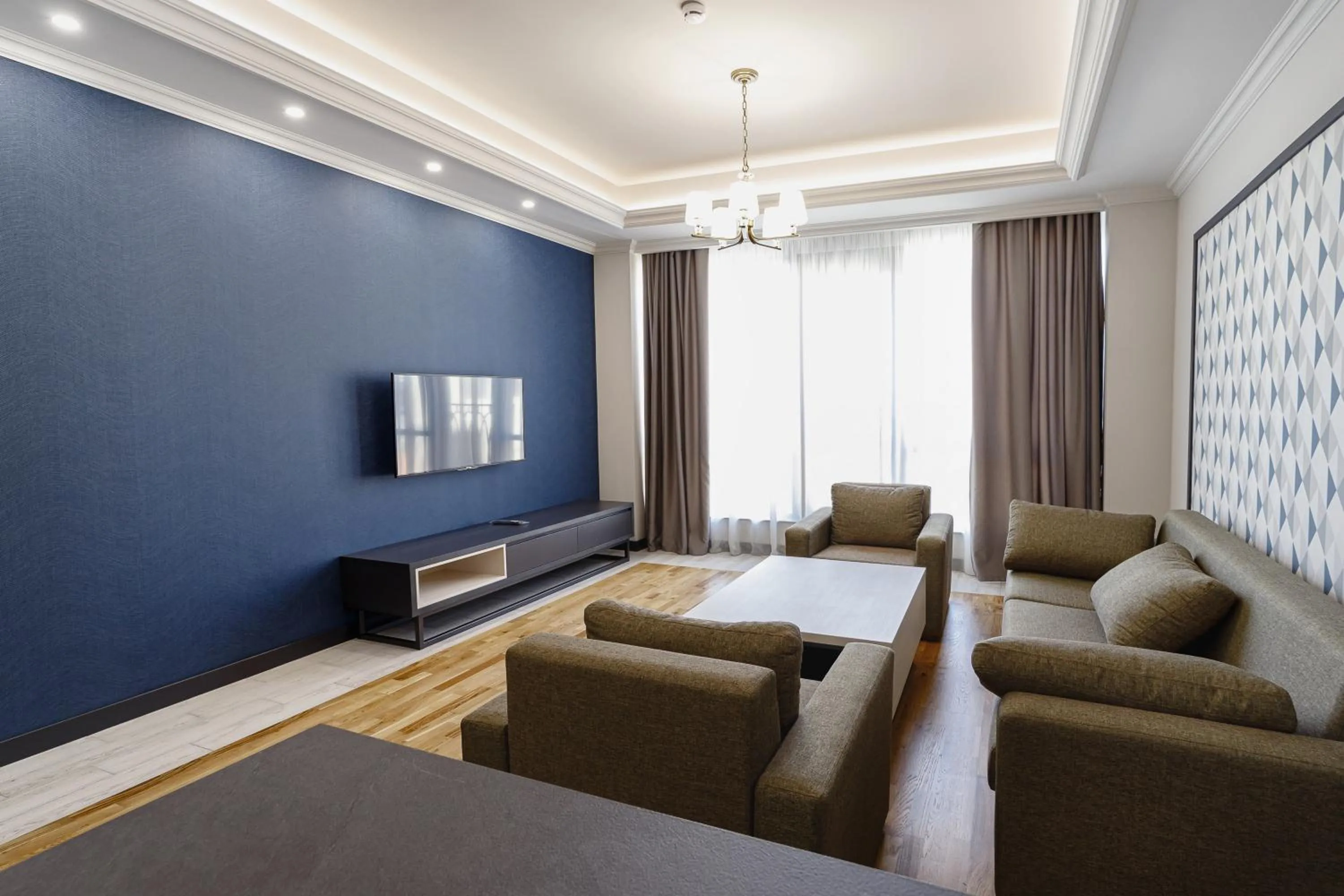 TV and multimedia in Hilltop North Avenue by Stellar Hotels, Yerevan