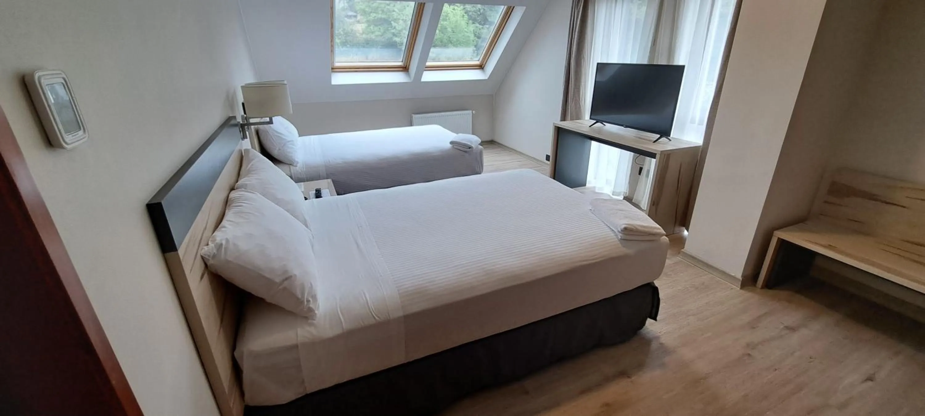 Bed in Hotel Diego de Almagro Castro