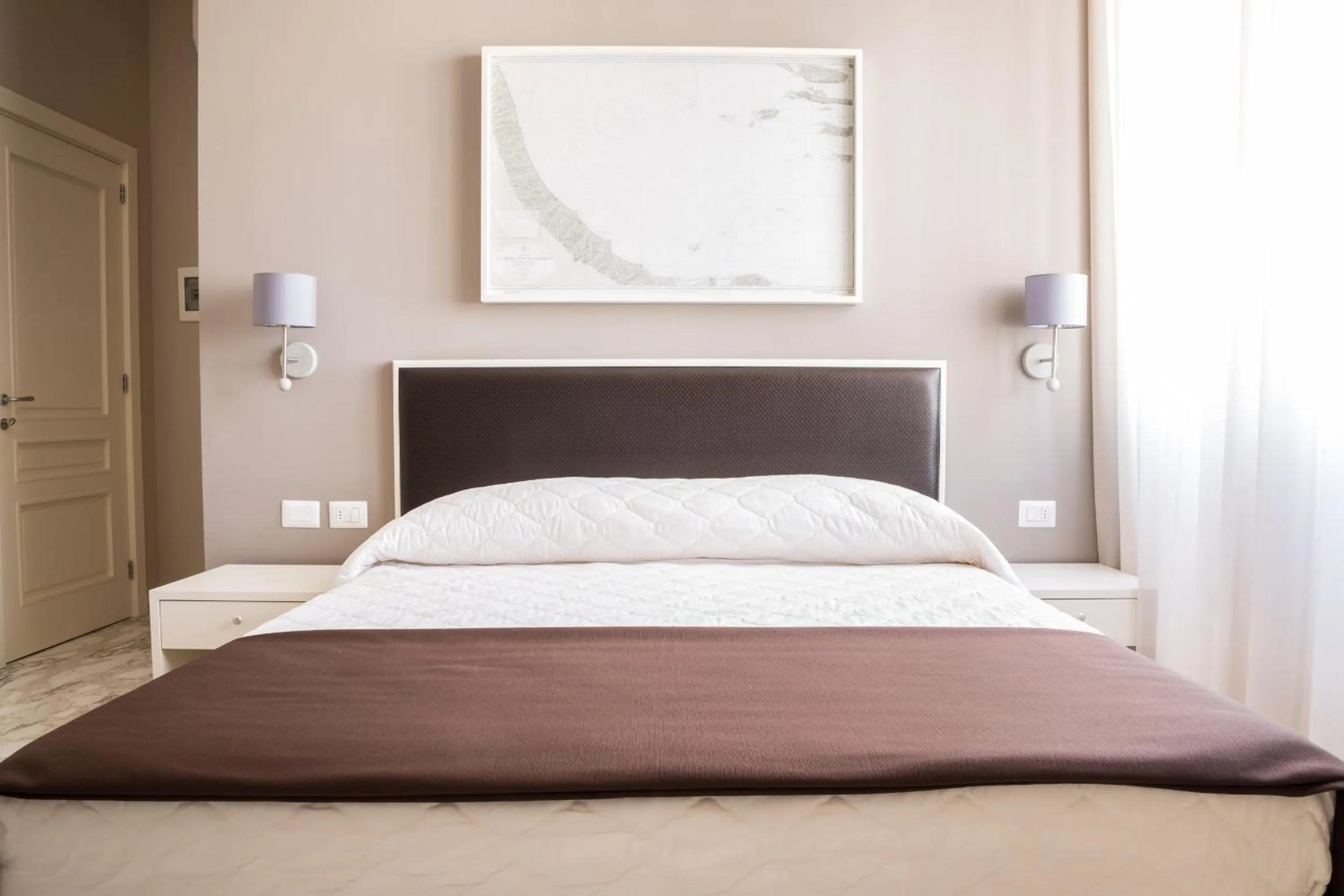 Bed in Faro Bianco Gallipoli Dependance