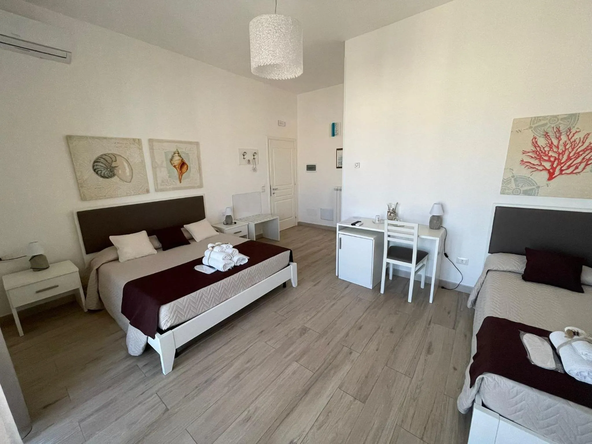 Bed in Faro Bianco Gallipoli Dependance