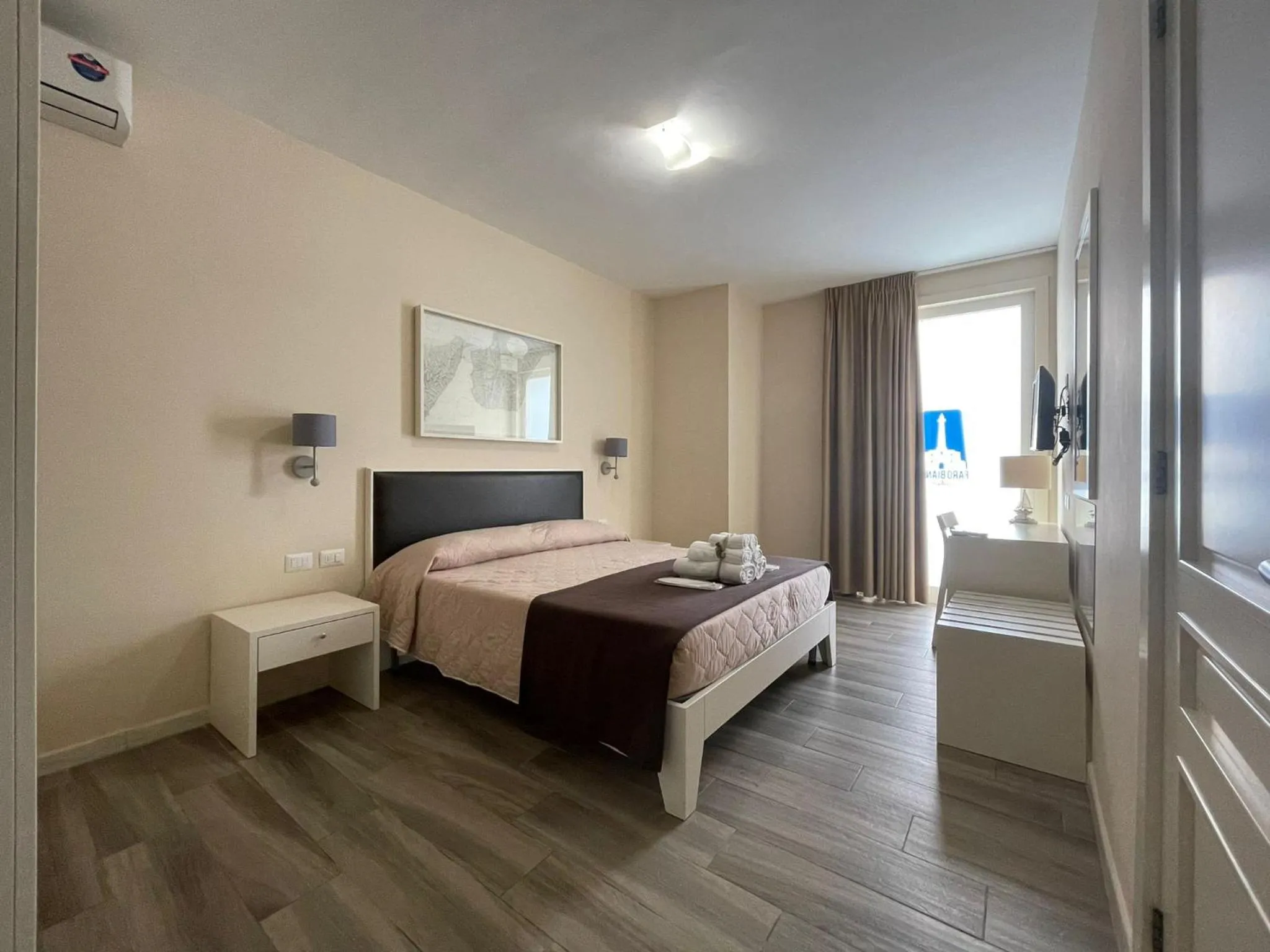 Bed in Faro Bianco Gallipoli Dependance