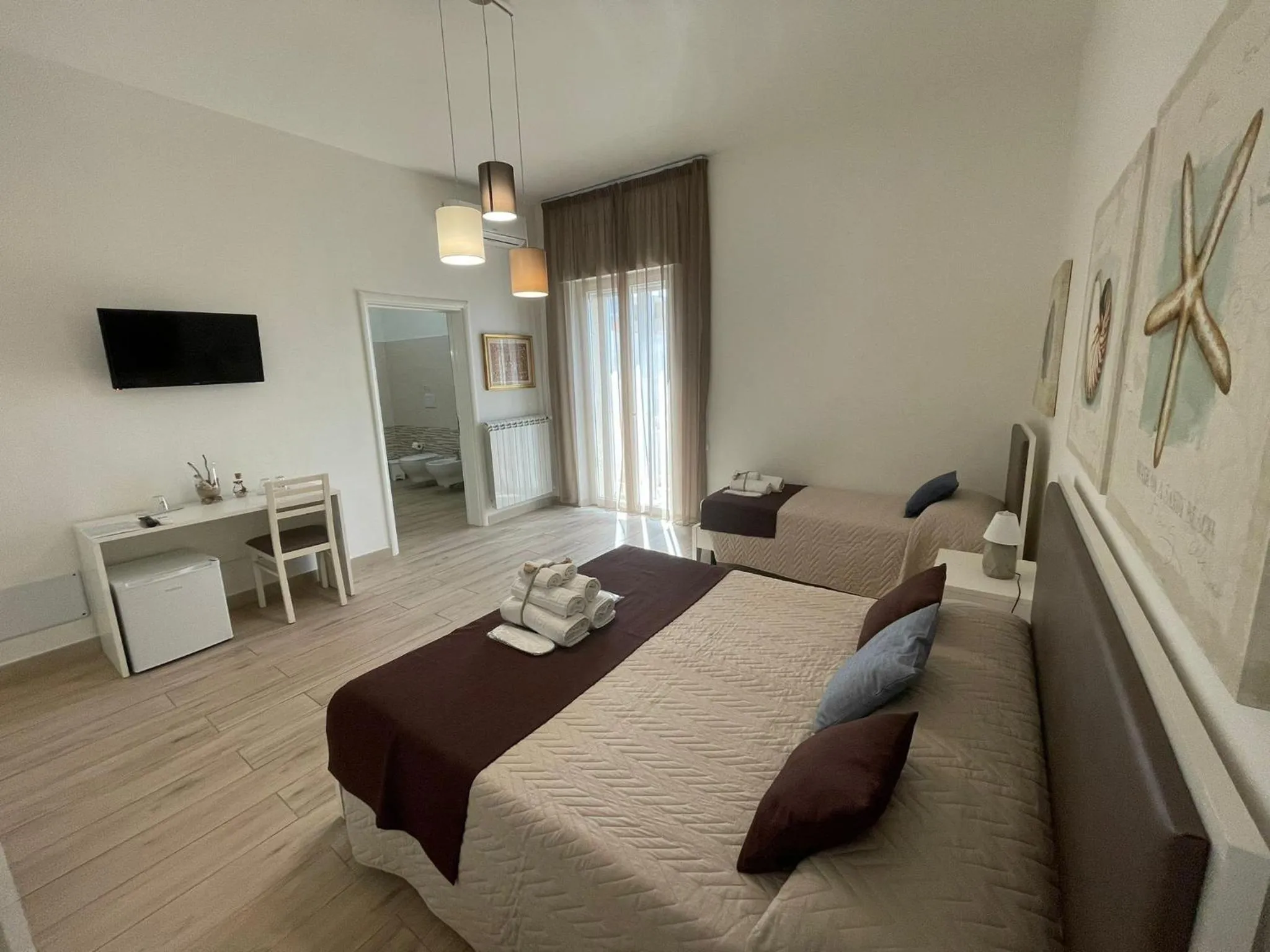 Bed in Faro Bianco Gallipoli Dependance