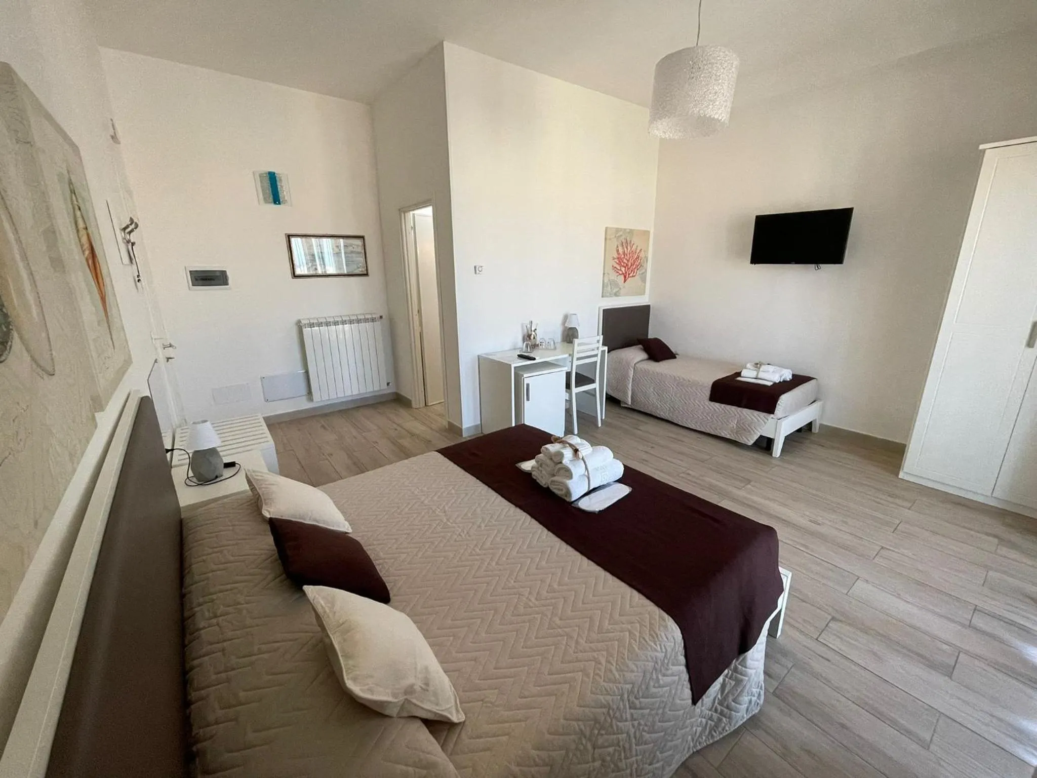 Bed in Faro Bianco Gallipoli Dependance