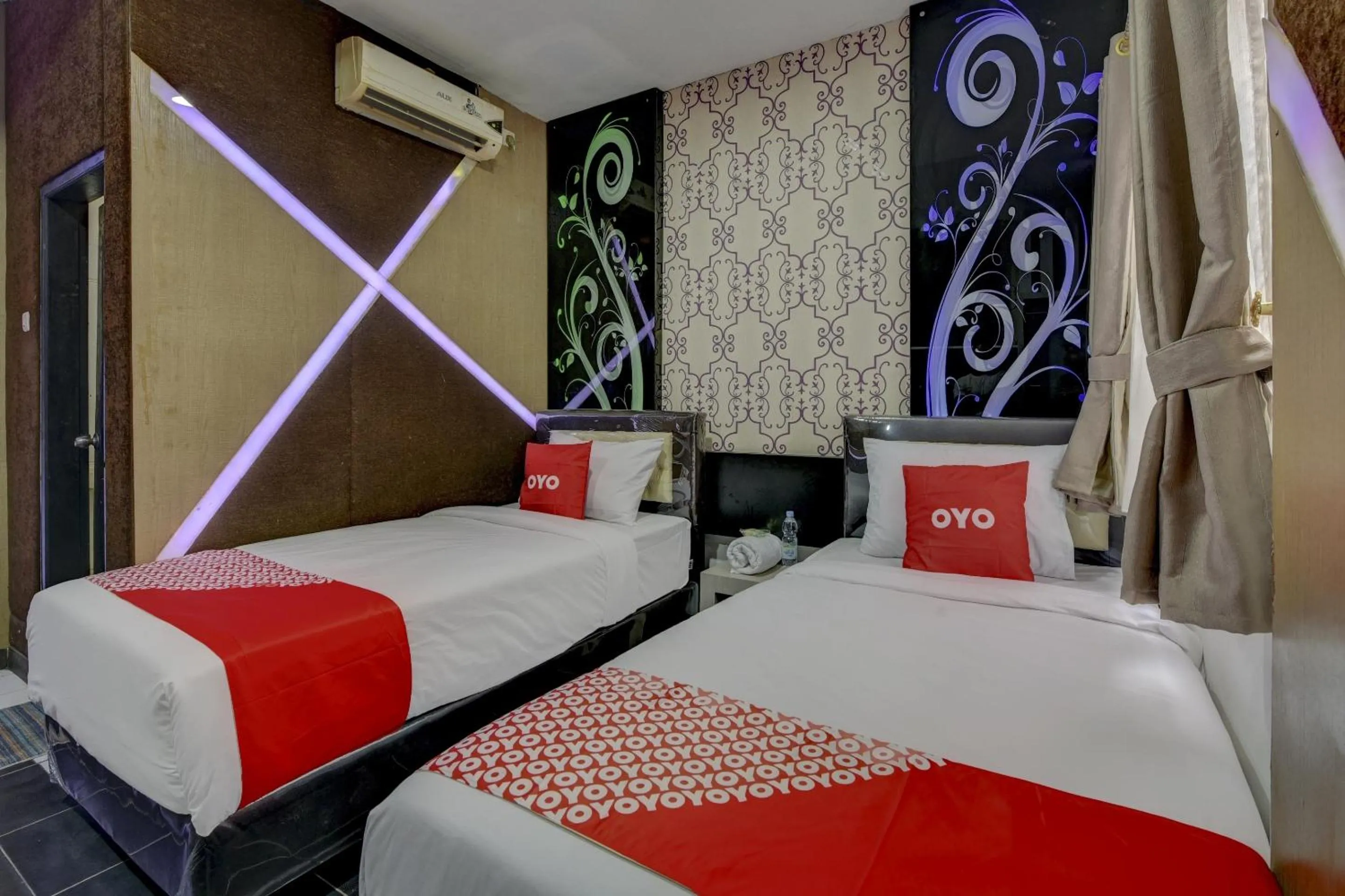 Bedroom in Super OYO 4010 Zaara Guest House Syariah