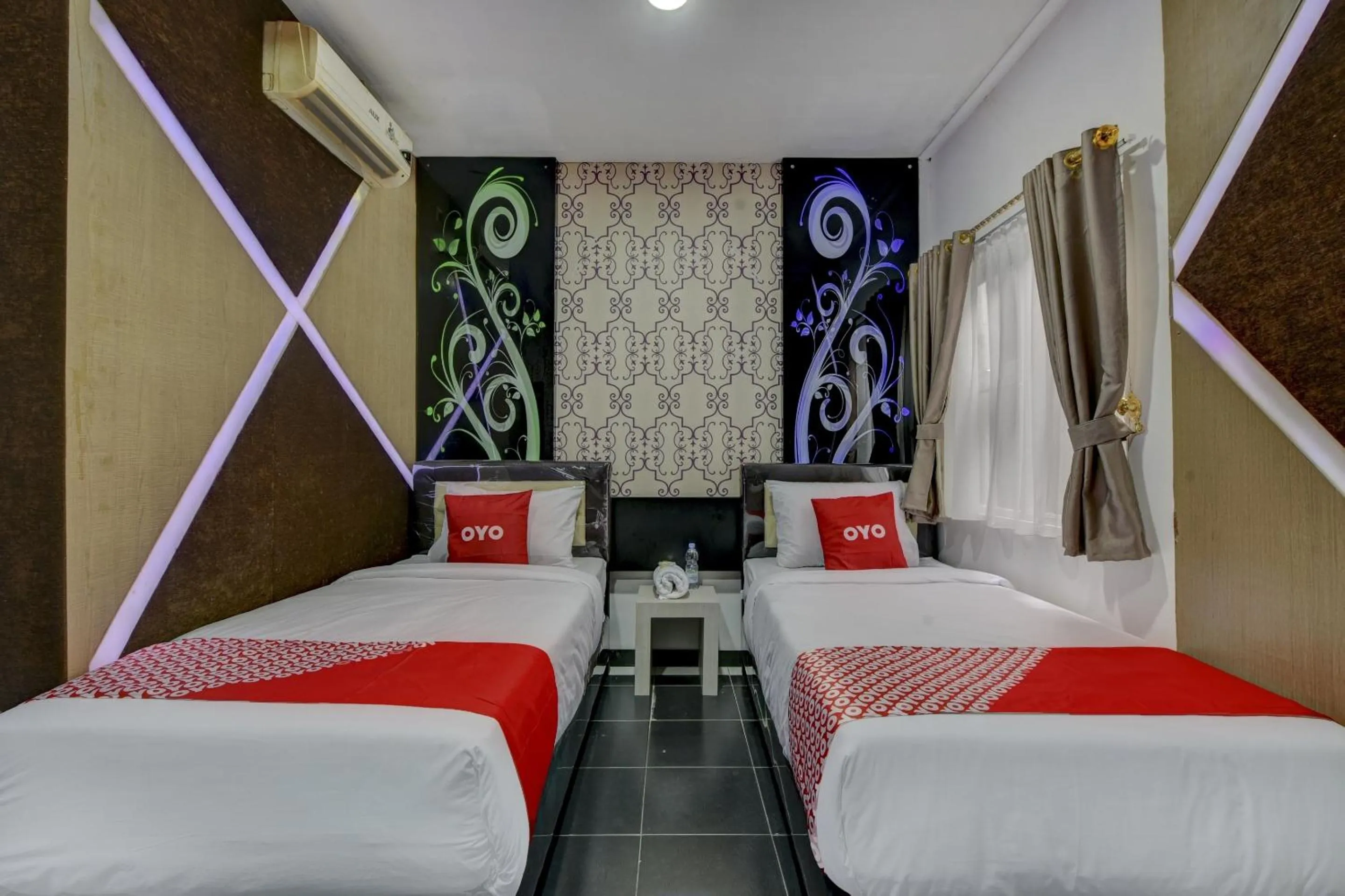 Bedroom in Super OYO 4010 Zaara Guest House Syariah