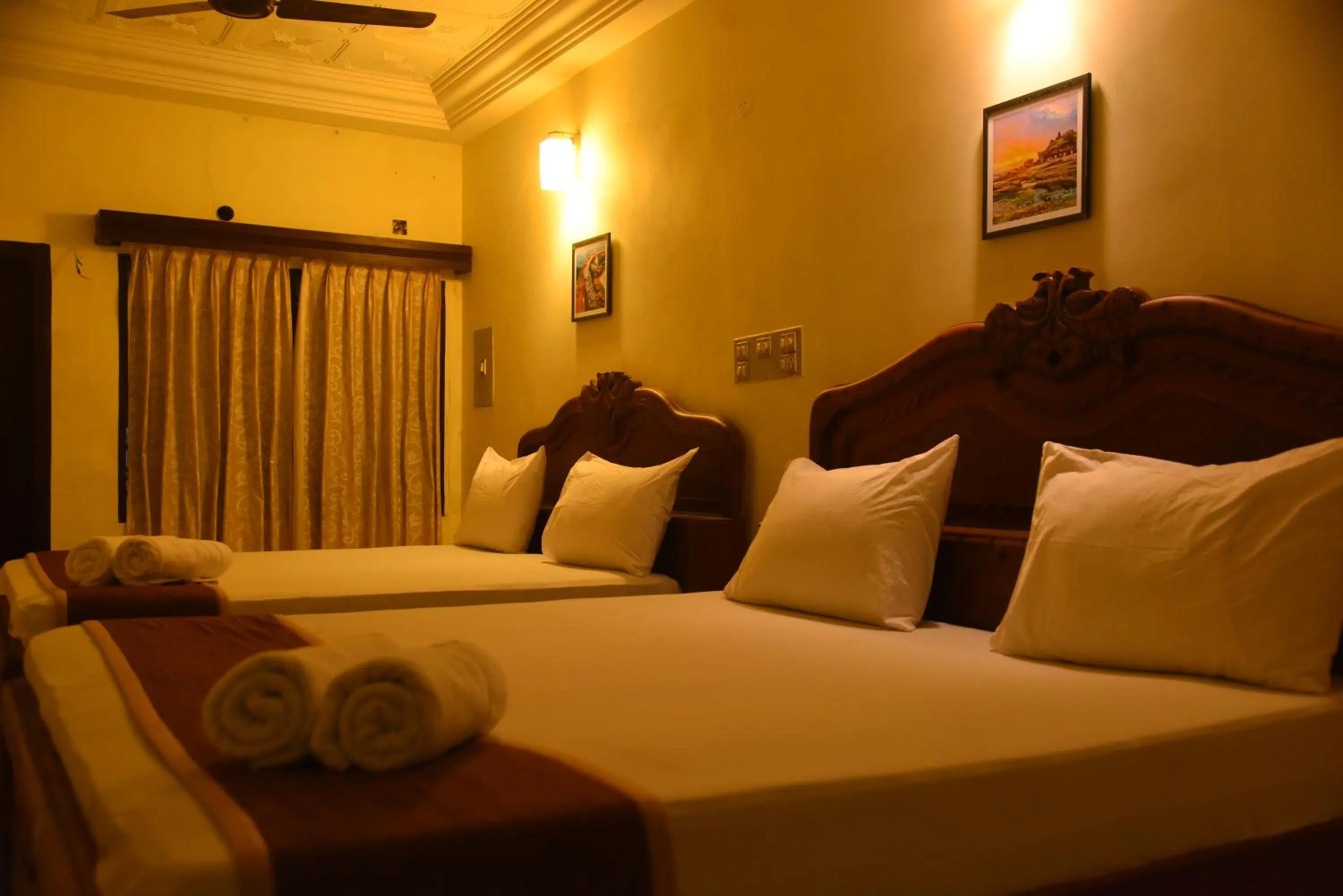 Bed in Hotel Raja Palace