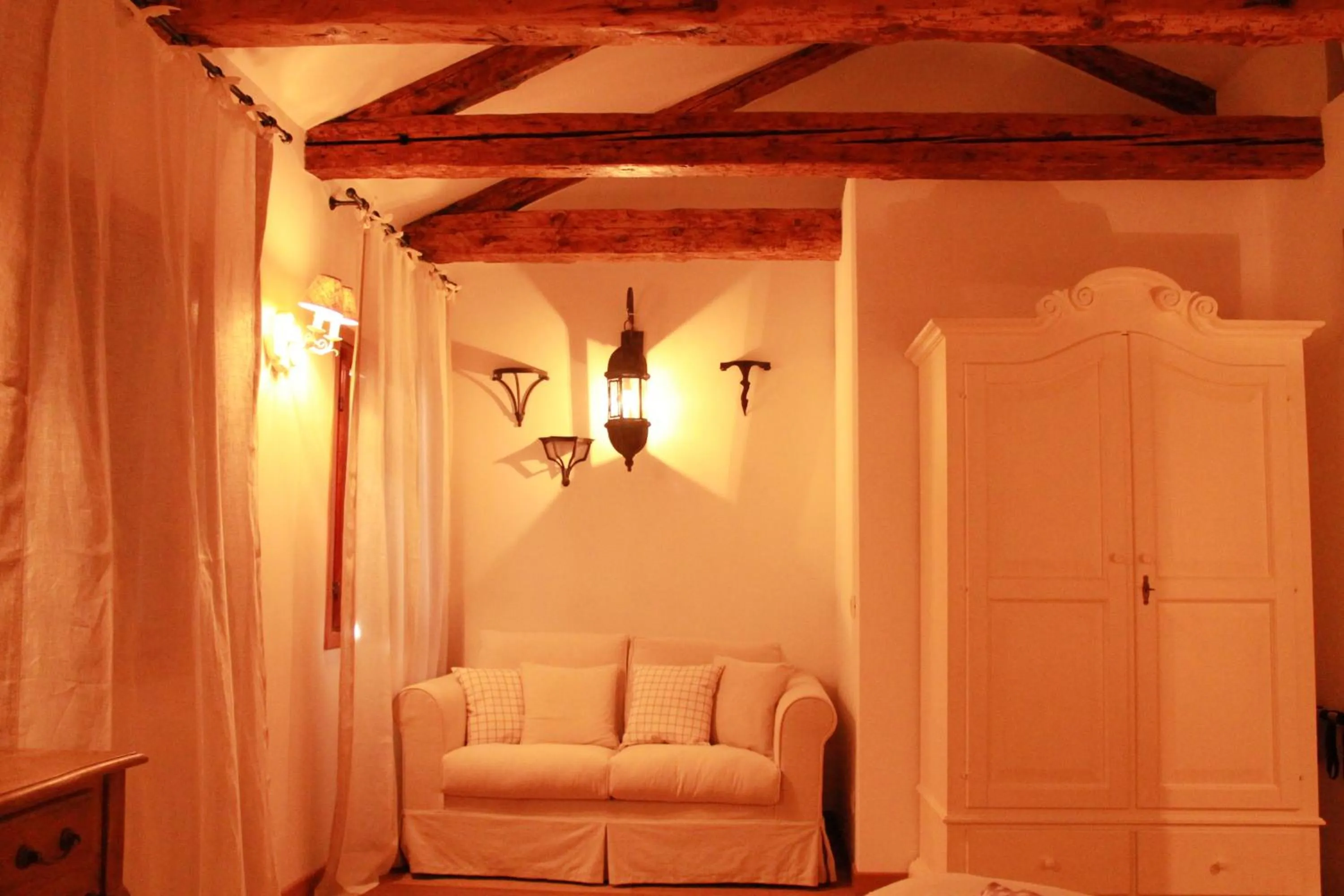 Seating area in Rigoletto Charm