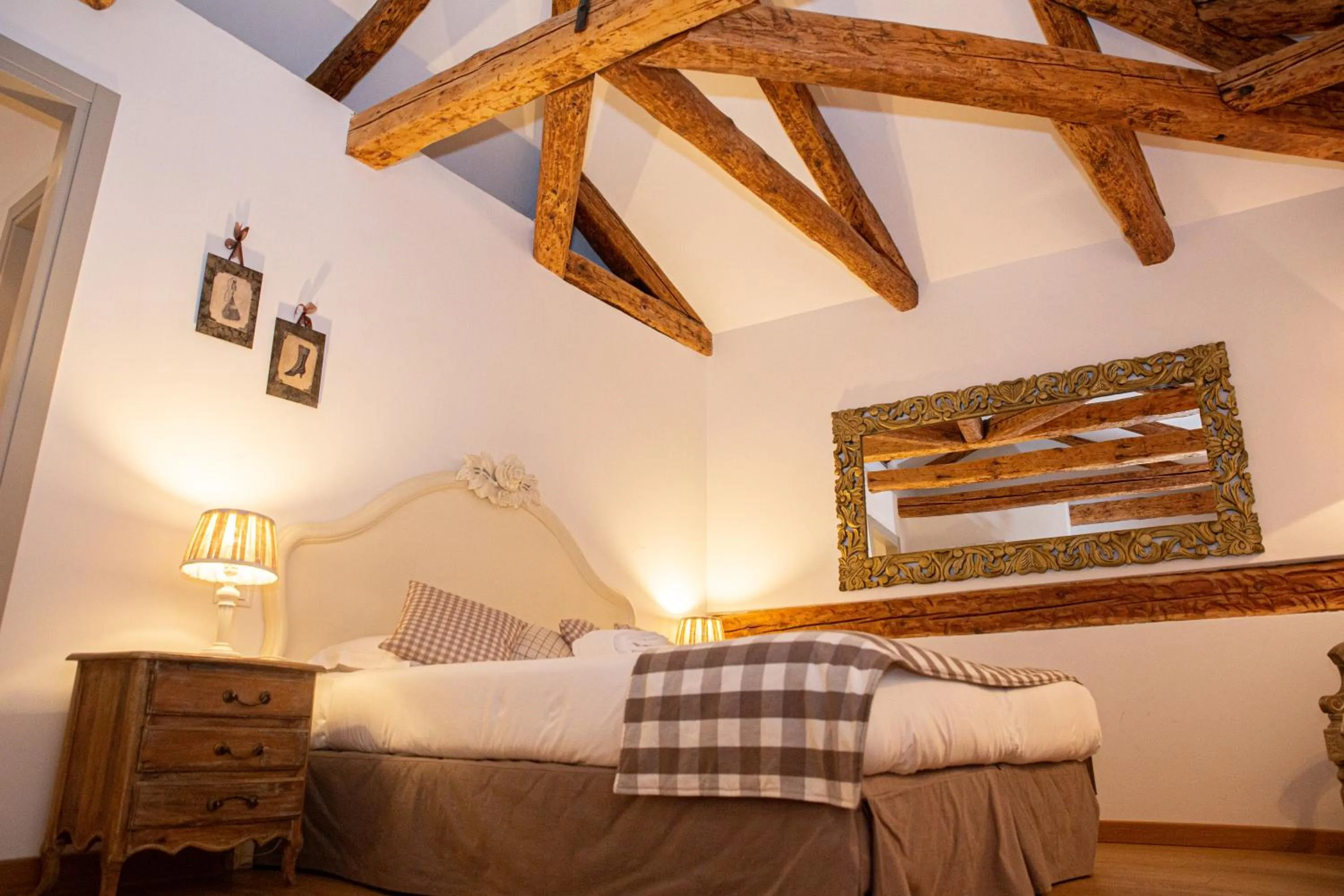 Photo of the whole room, Bed in Rigoletto Charm