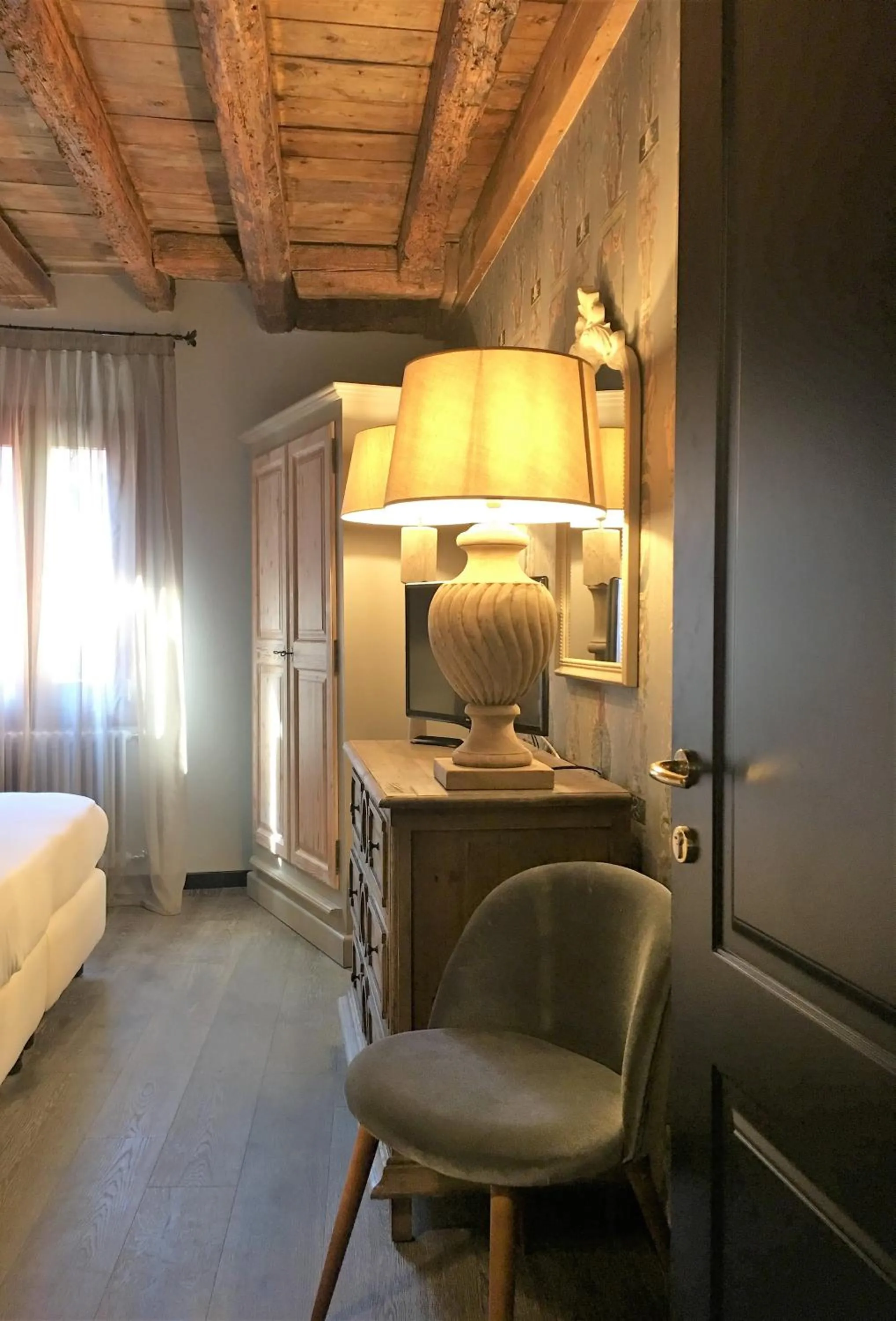 Living room, Bed in Rigoletto Charm