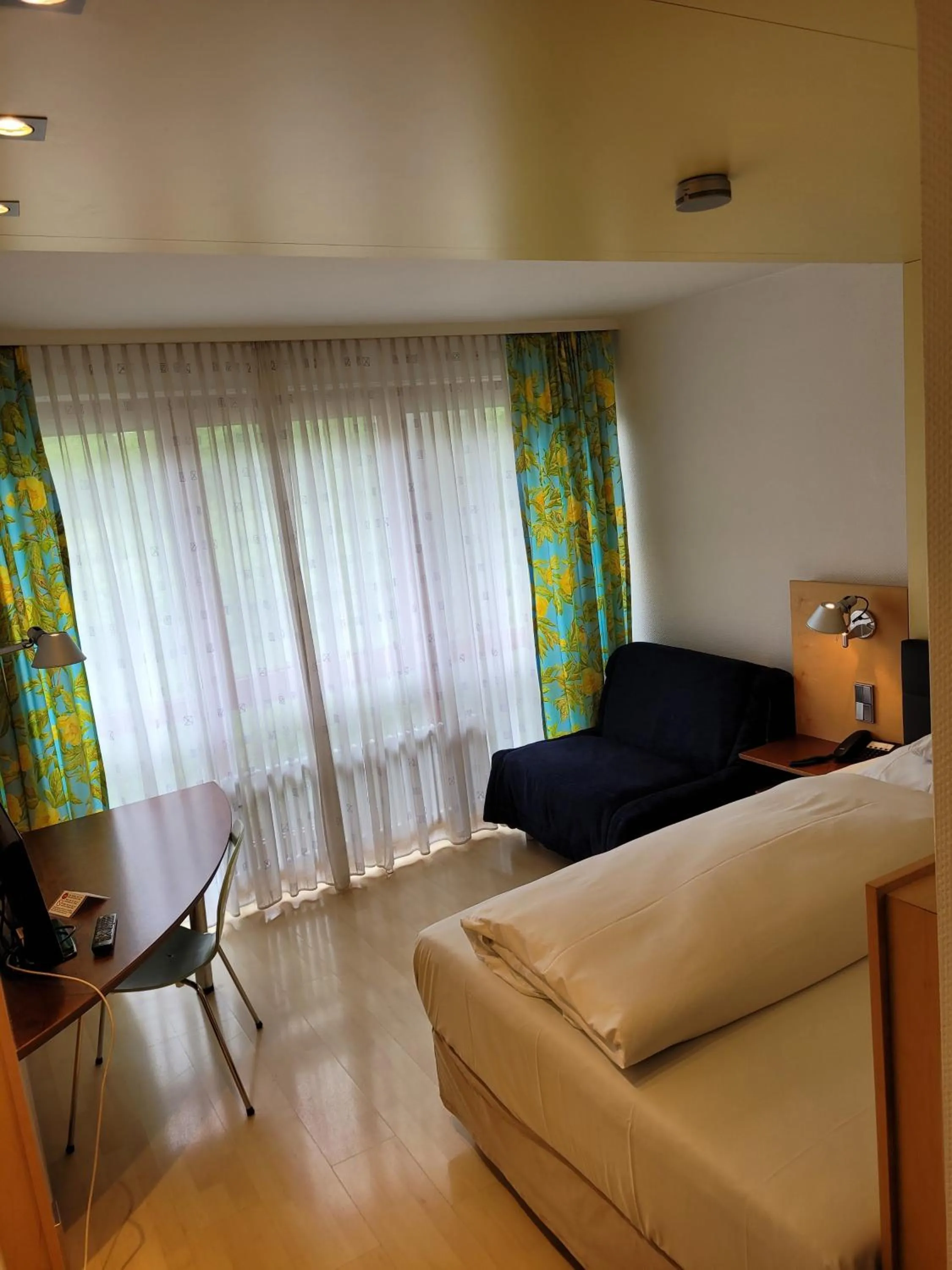 Living room, Bed in Hotel Baden-Baden