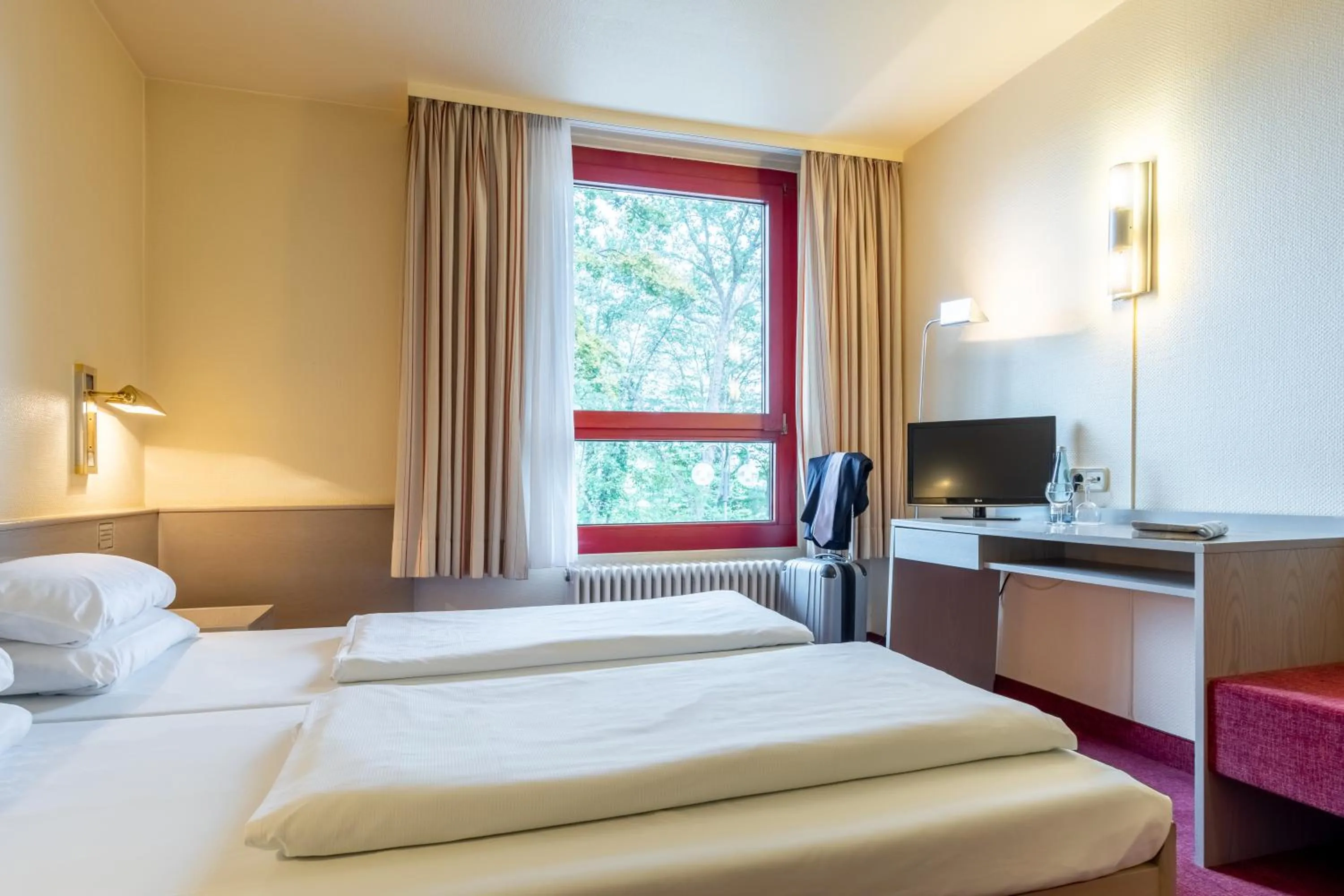 Photo of the whole room, Bed in Hotel Baden-Baden