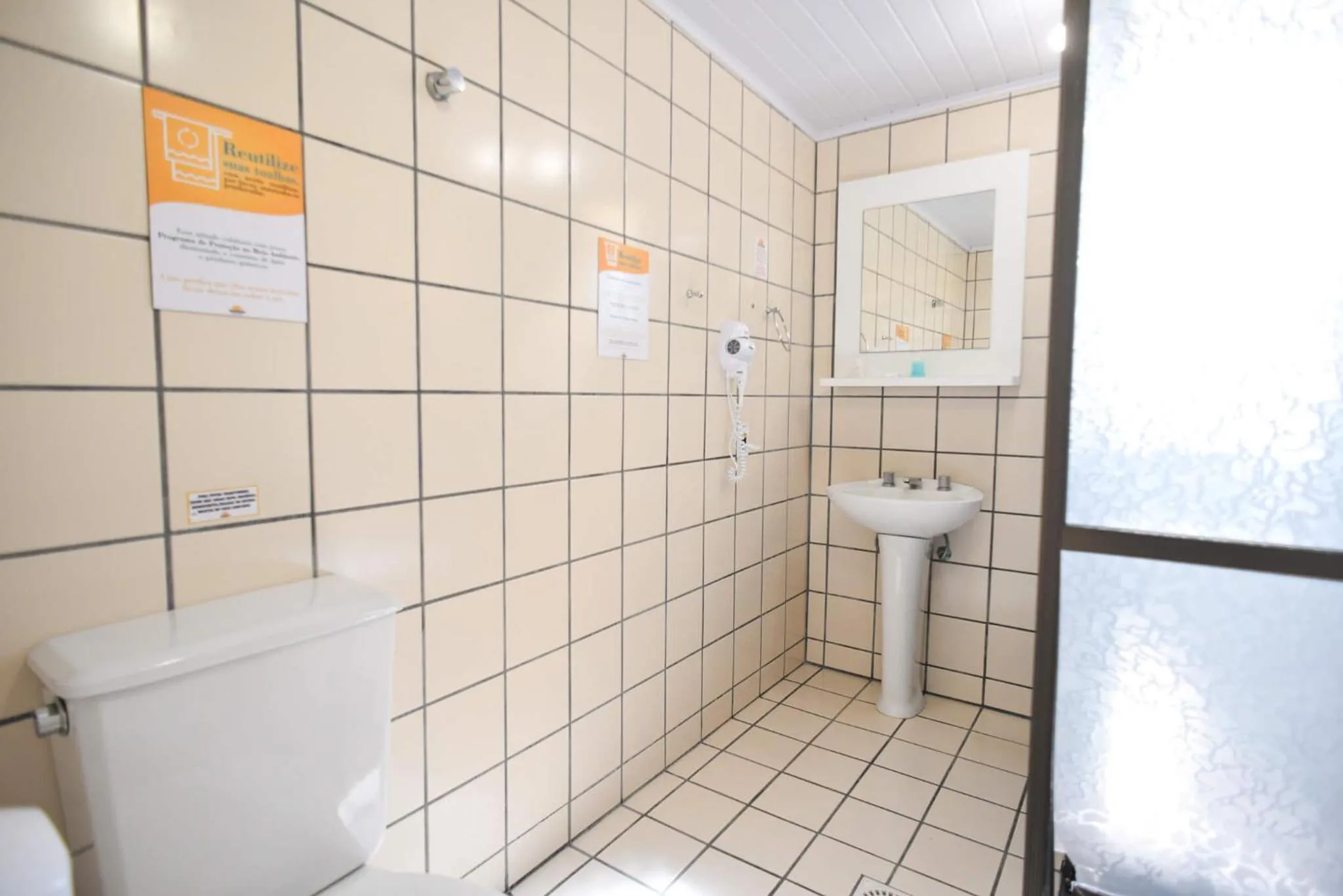 Toilet in Morro do Sol Hotel & Eventos