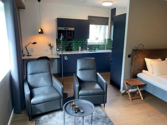 Seating area, Bed in Magnolia House Norrviken