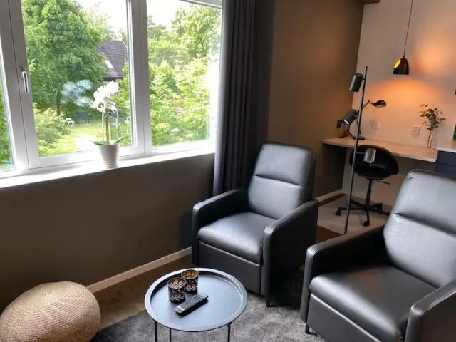 Seating area in Magnolia House Norrviken