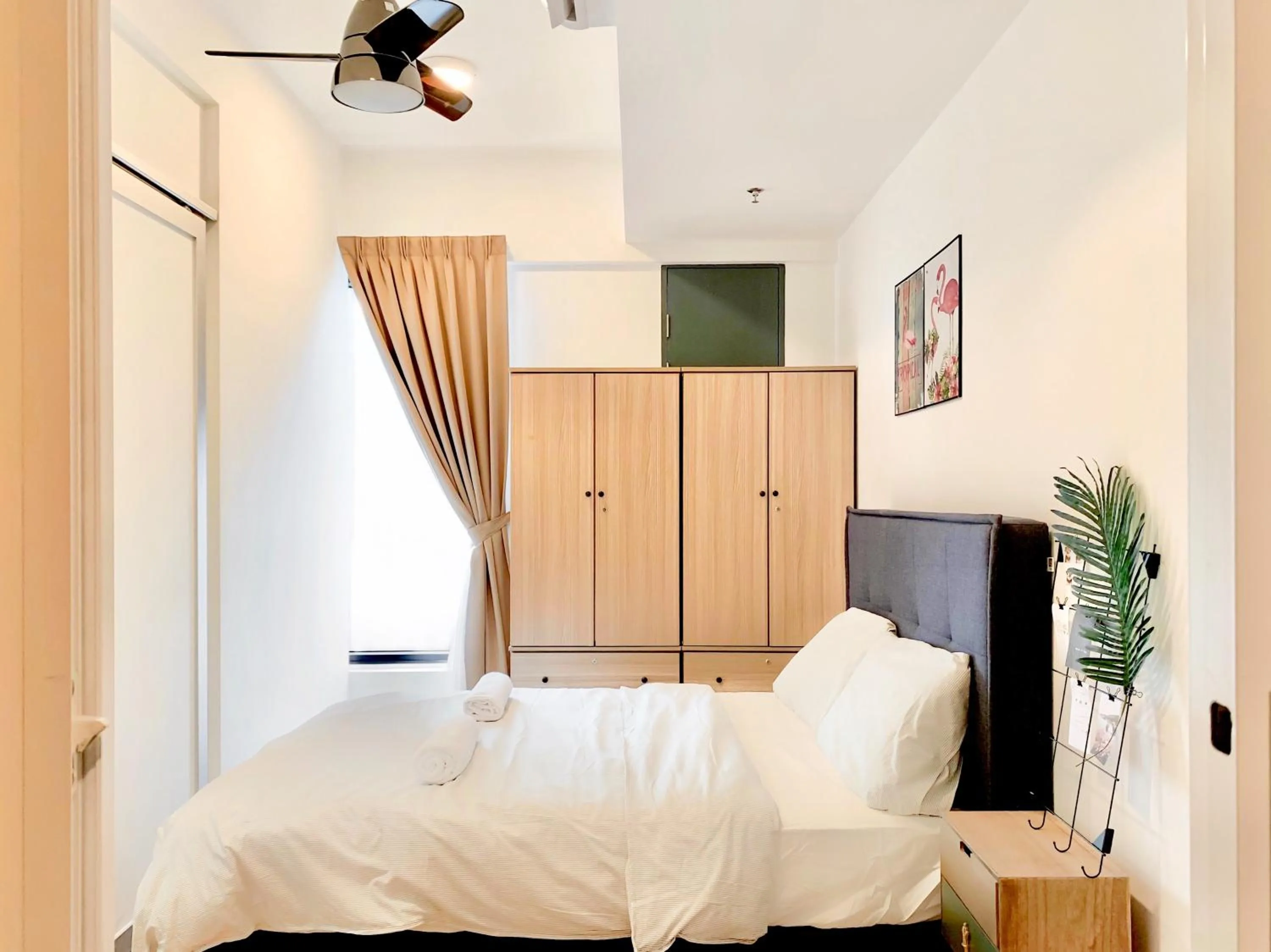 Bed in Georgetown Tropicana 218 Apartment