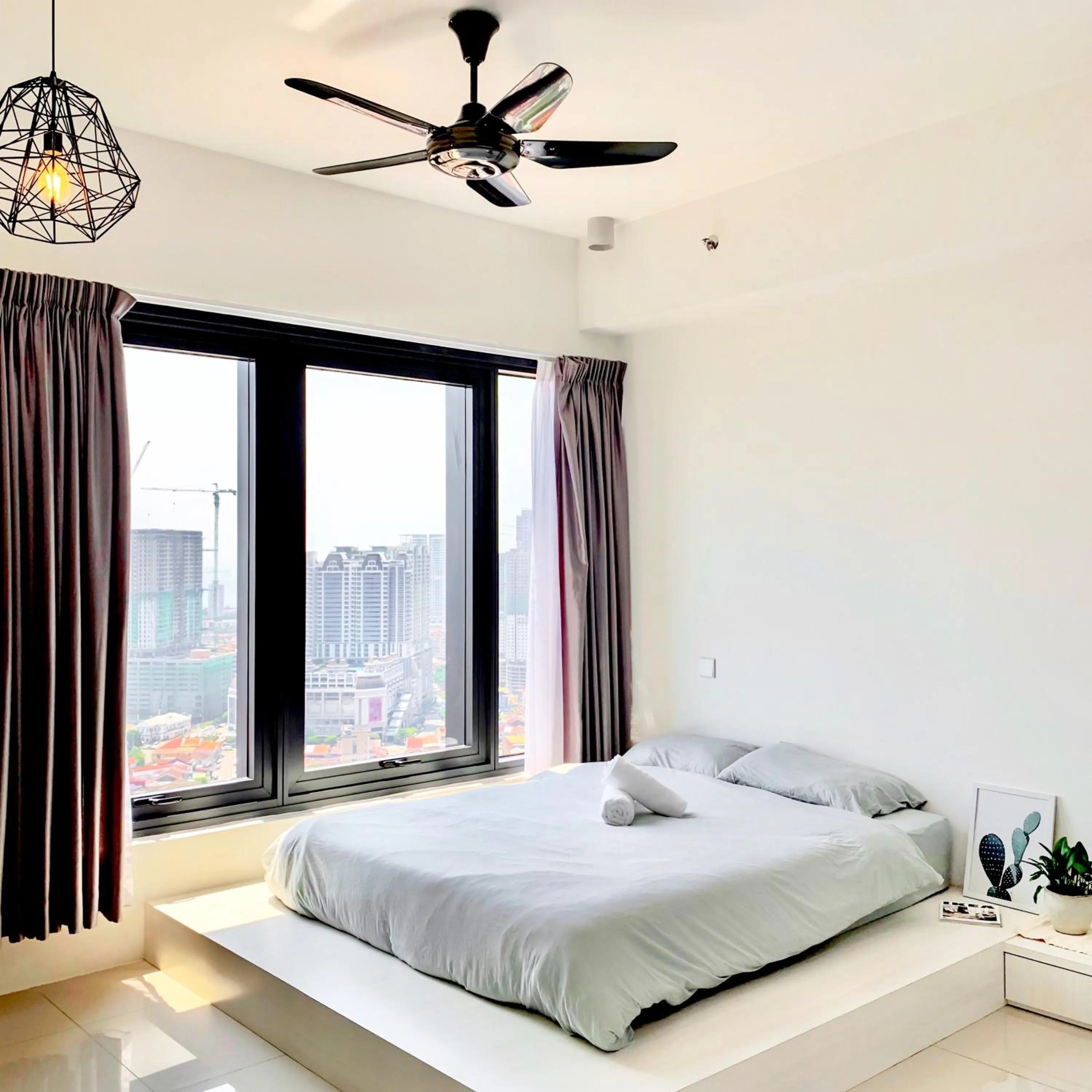 Bed in Georgetown Tropicana 218 Apartment