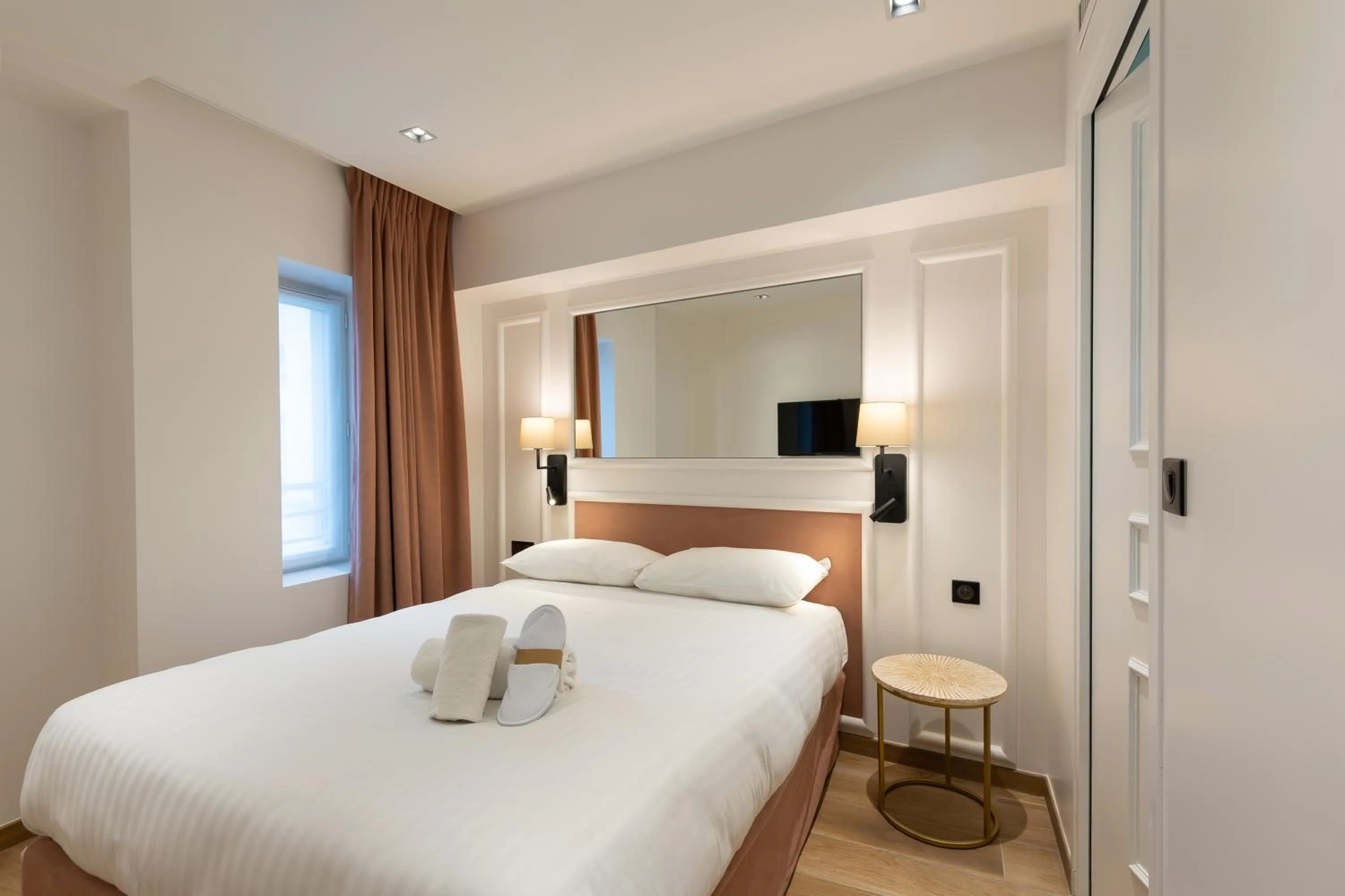 Photo of the whole room, Bed in HOTEL AU COEUR DE REPUBLIQUE