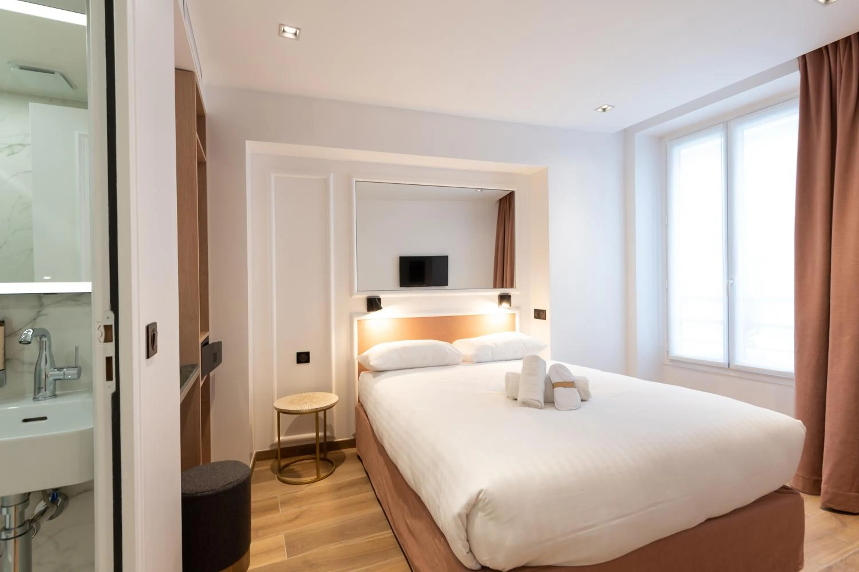 Photo of the whole room, Bed in HOTEL AU COEUR DE REPUBLIQUE