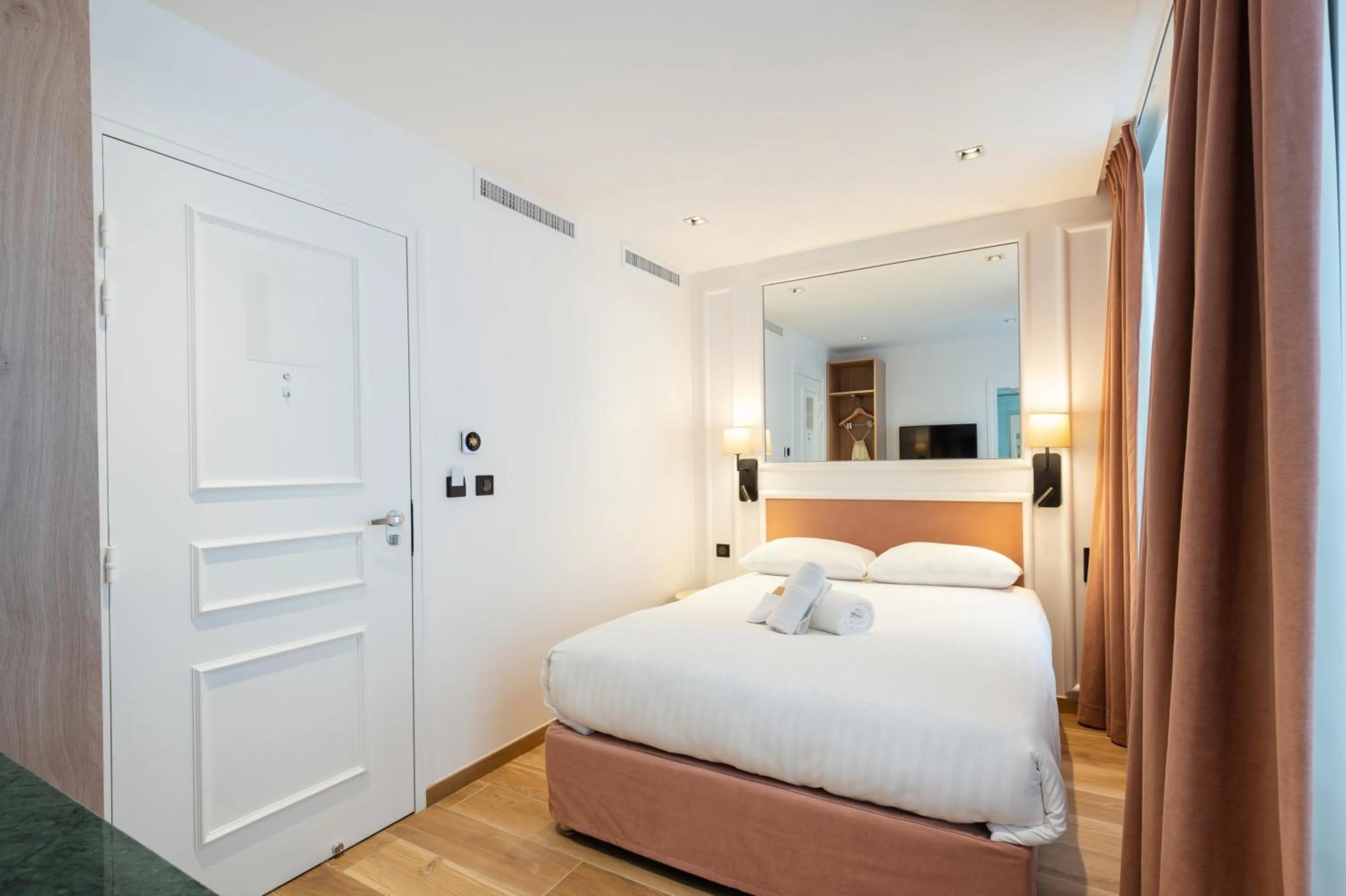 Photo of the whole room, Bed in HOTEL AU COEUR DE REPUBLIQUE