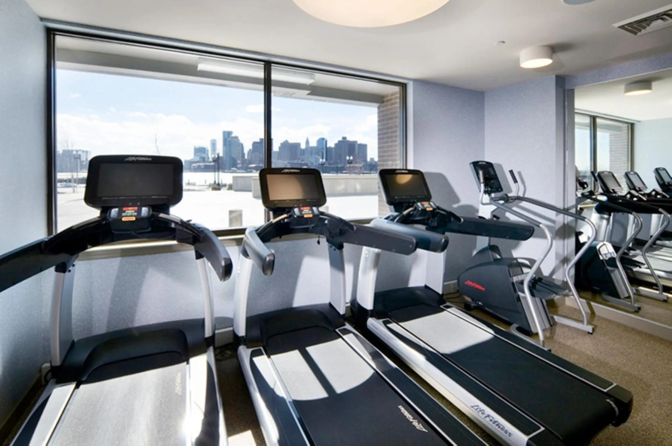 Fitness centre/facilities in Global Luxury Suites East Boston