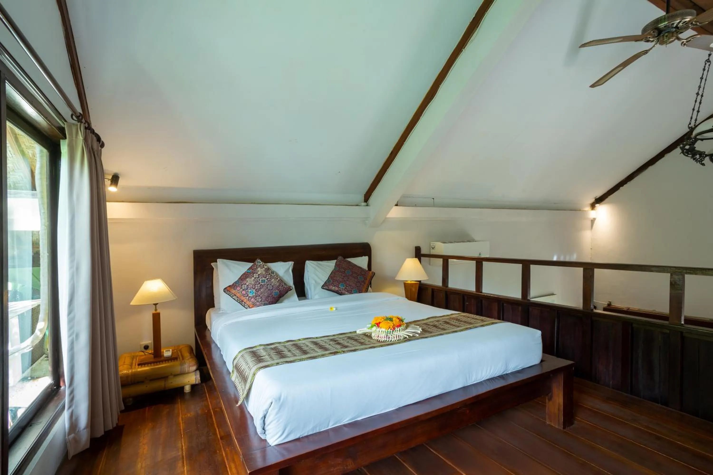 Bed in Rahayu Suites Monkey Forest Ubud
