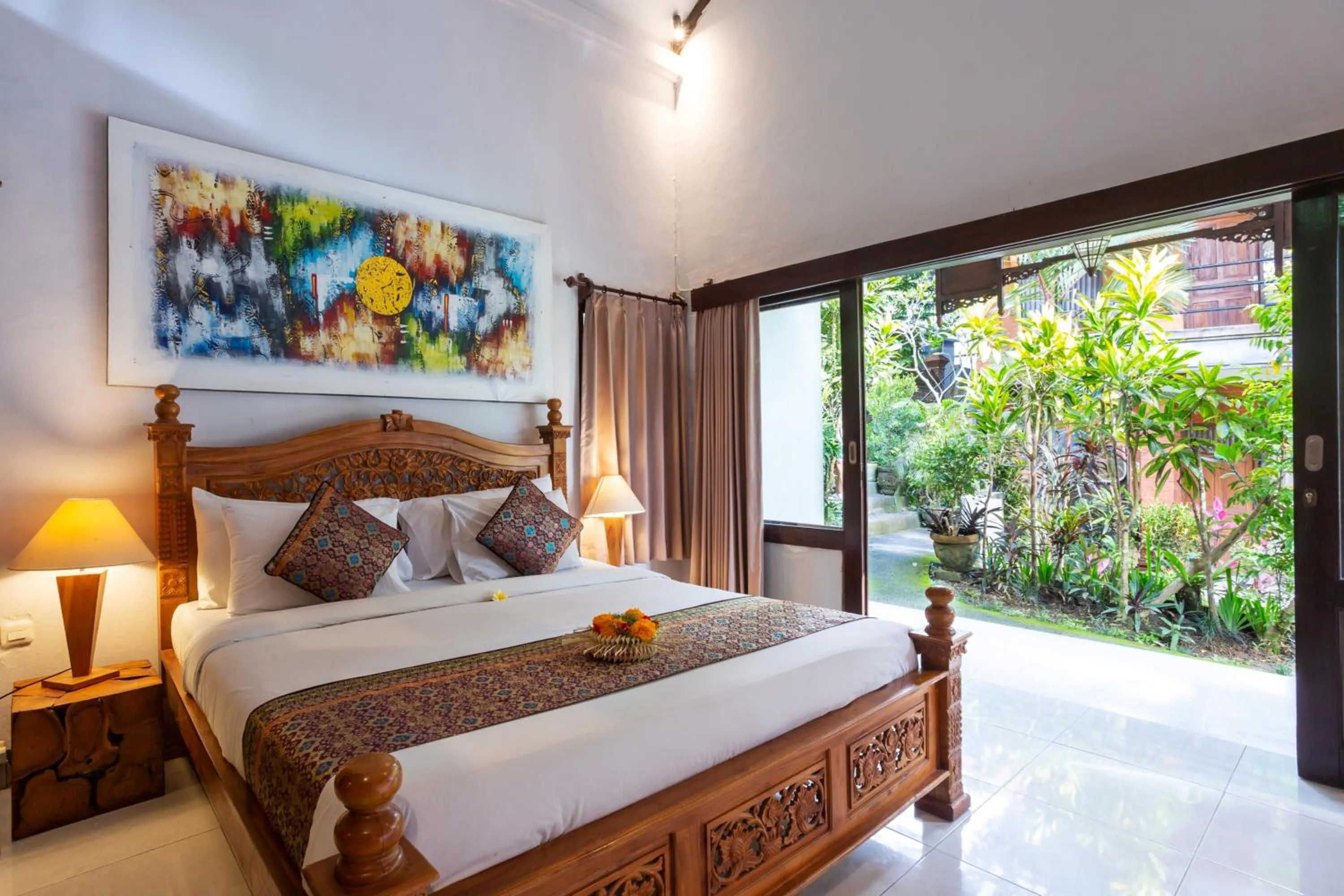 Bed in Rahayu Suites Monkey Forest Ubud