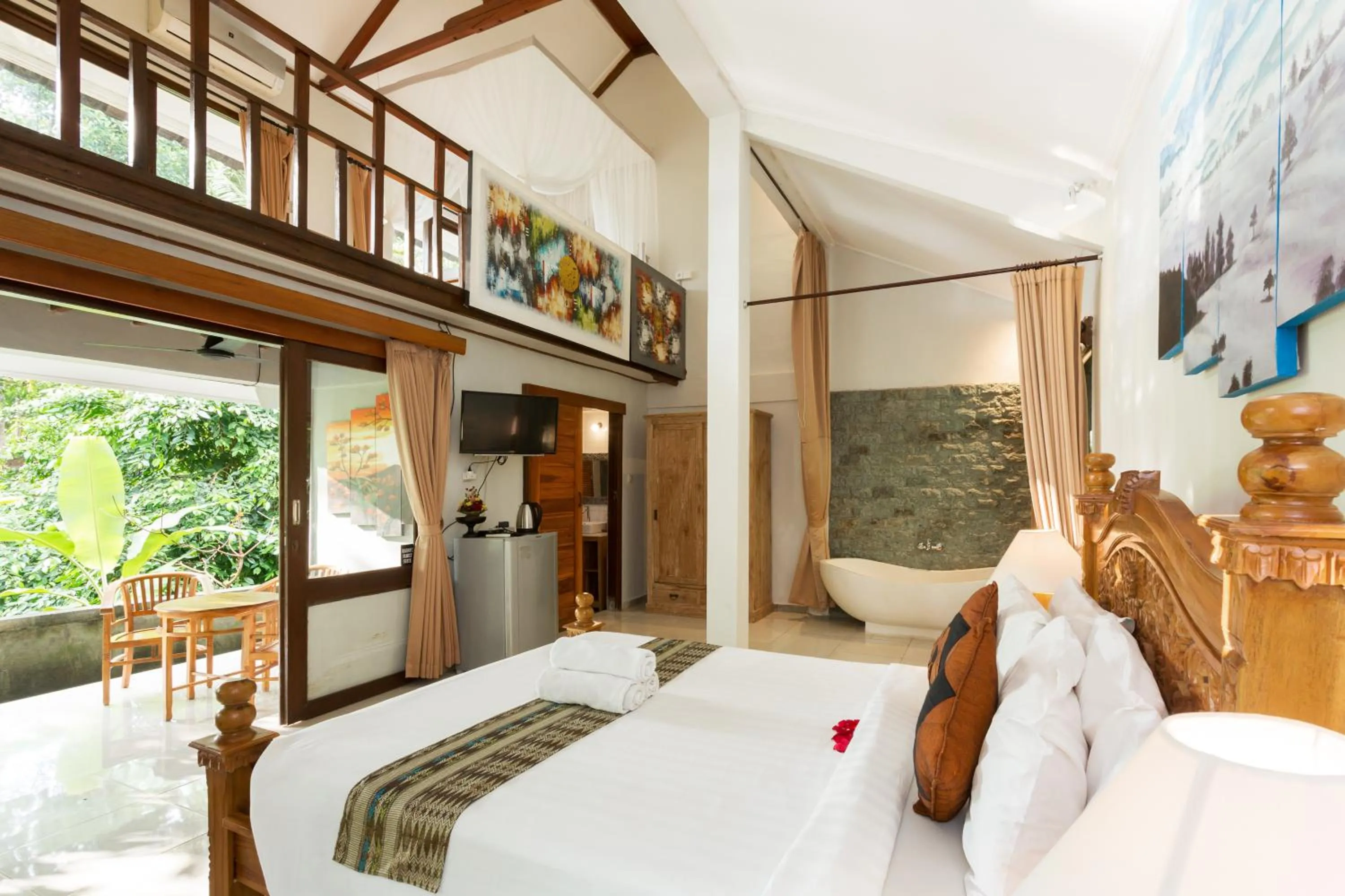 Photo of the whole room, Bed in Rahayu Suites Monkey Forest Ubud