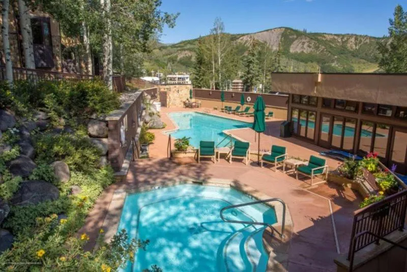 Property building in Snowmass Woodrun V 4 Bedroom Ski In, Ski Out Mountain Residence In The Heart Of Snowmass Village