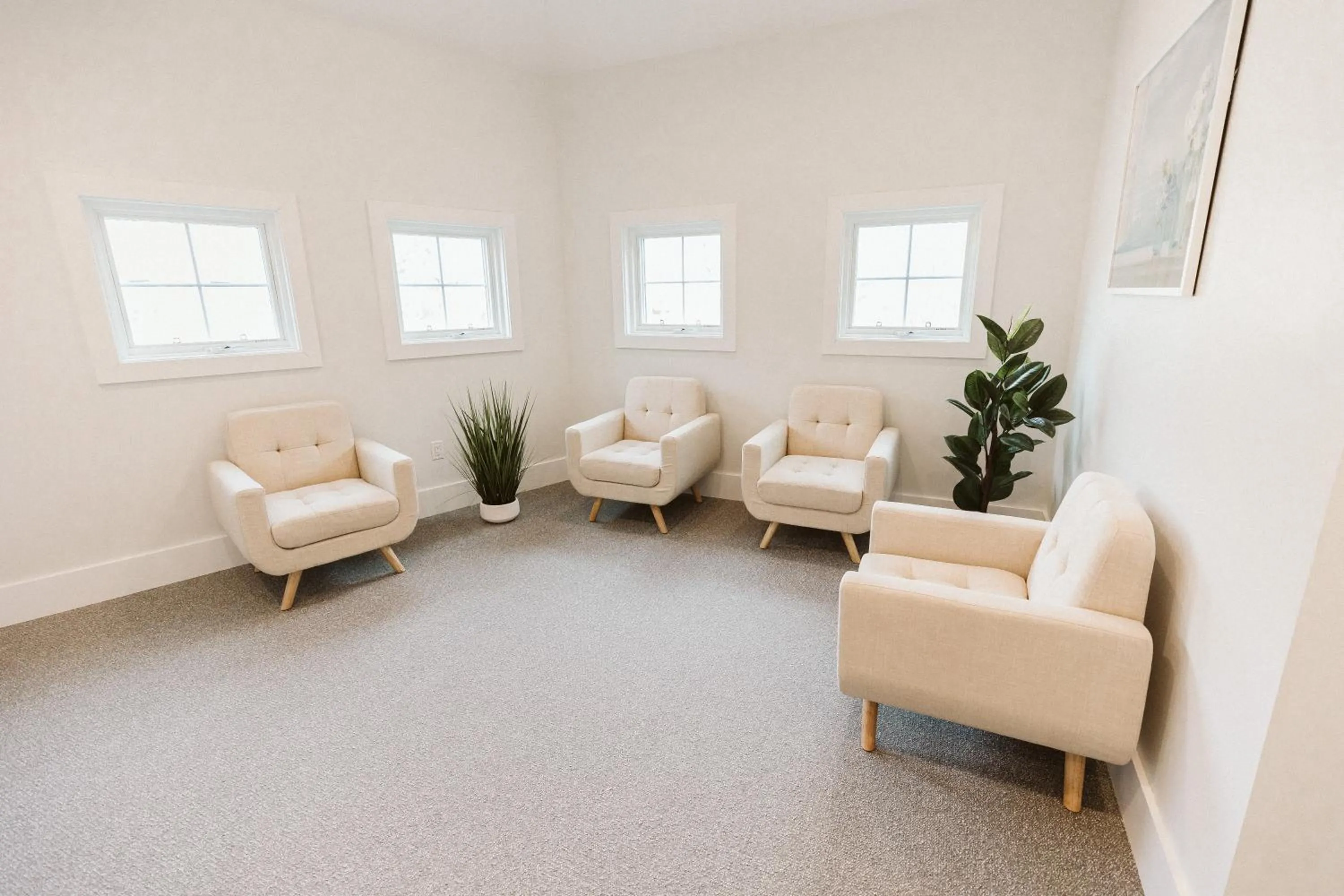 Communal lounge/ TV room in Grasshopper Inn