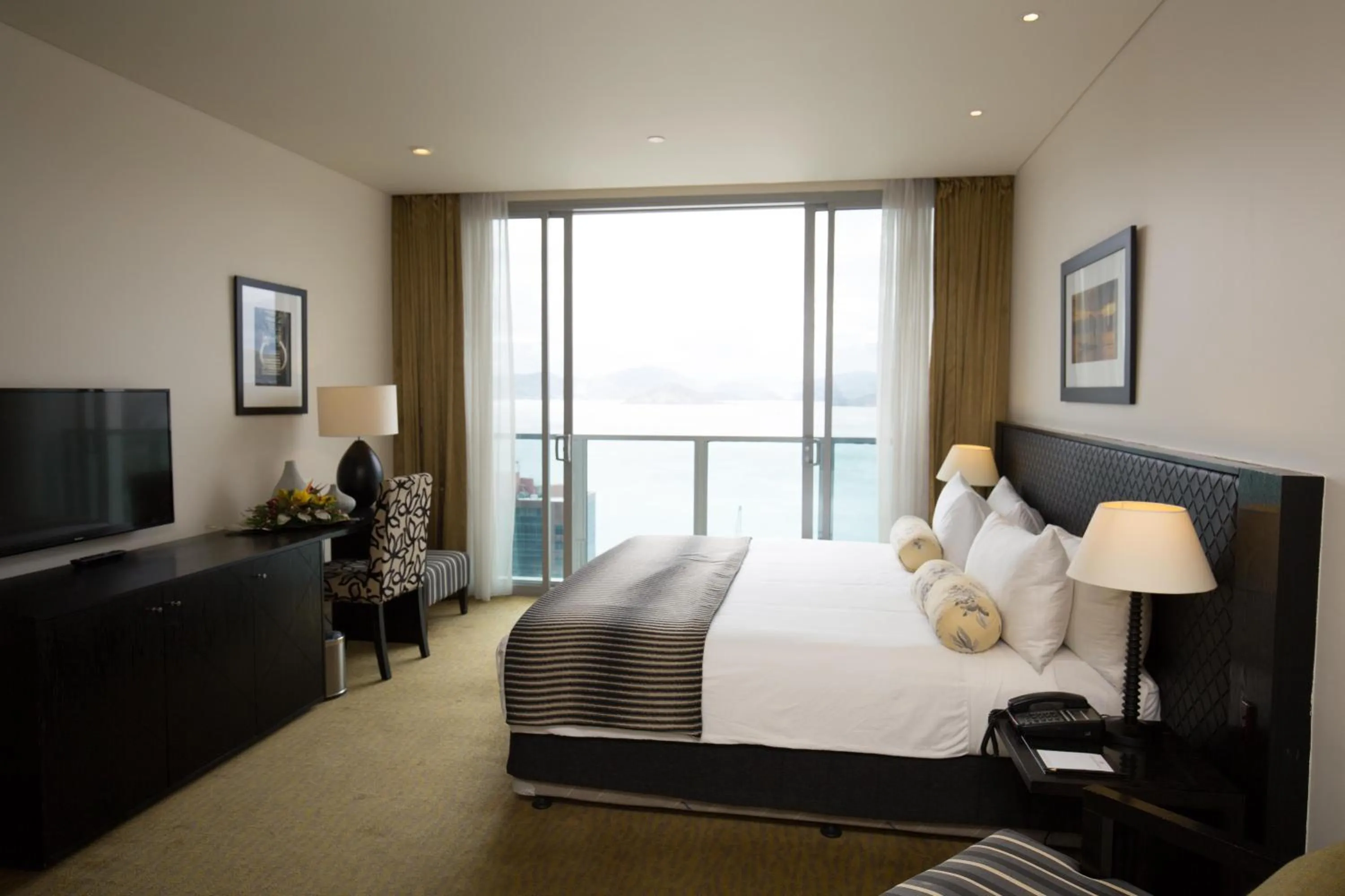 Bed in Grand Papua Hotel