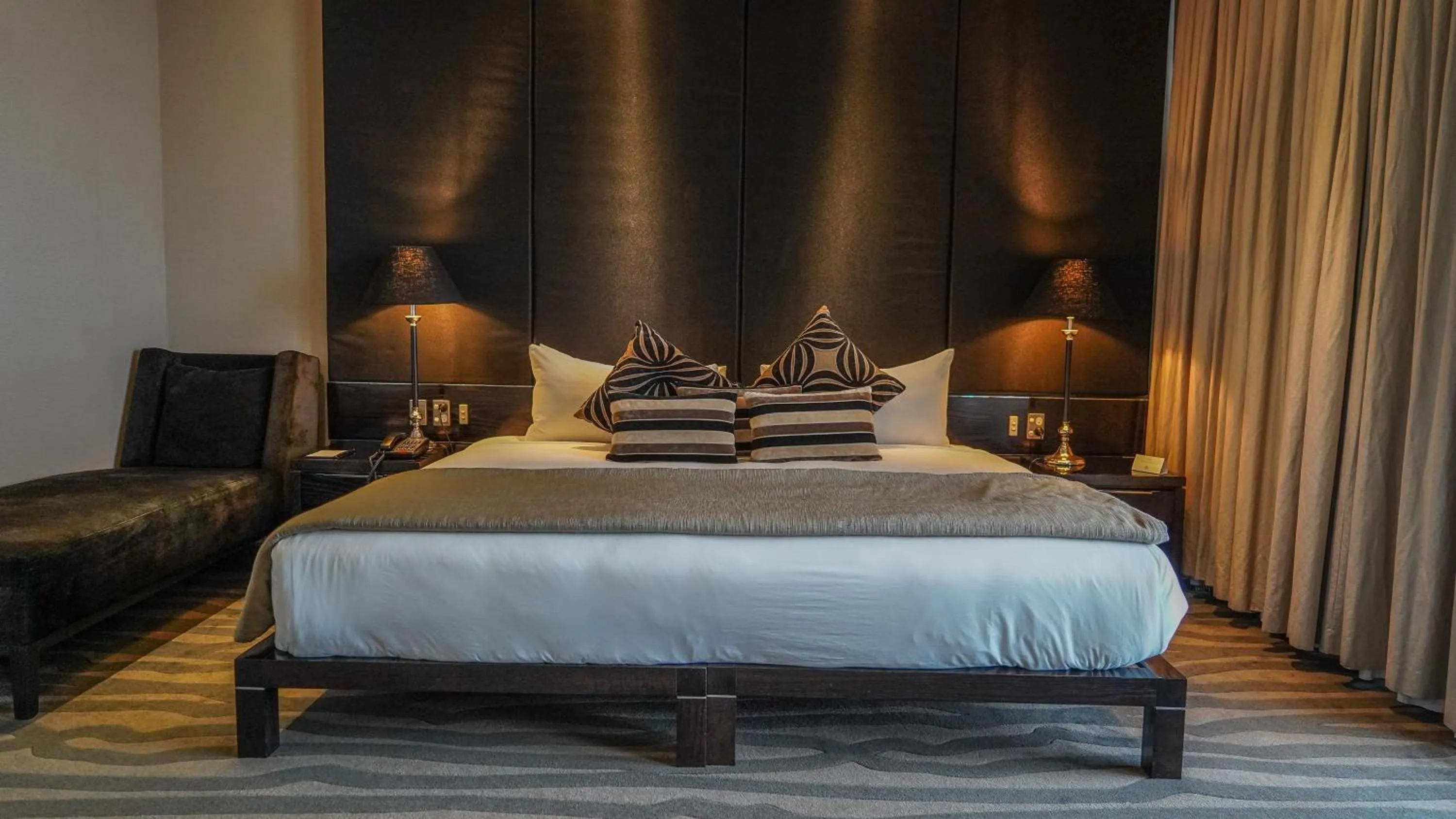 Bed in Grand Papua Hotel