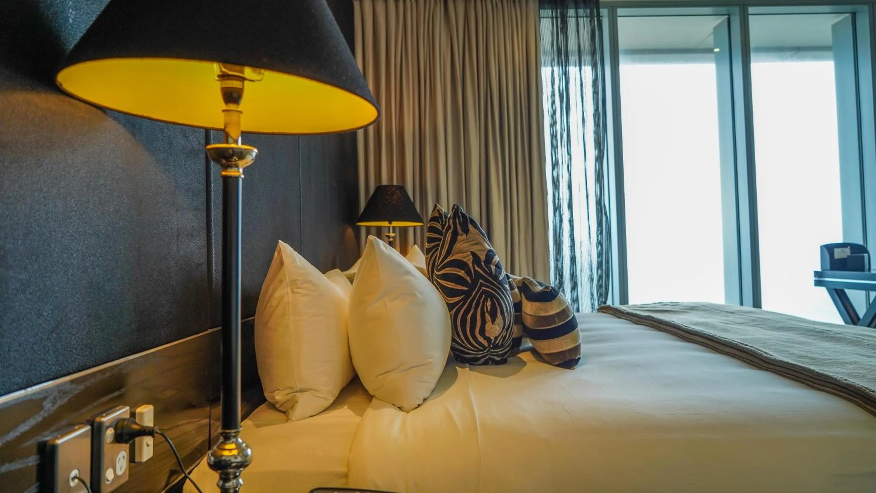 Bed in Grand Papua Hotel