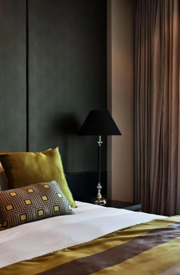 Bed in Grand Papua Hotel