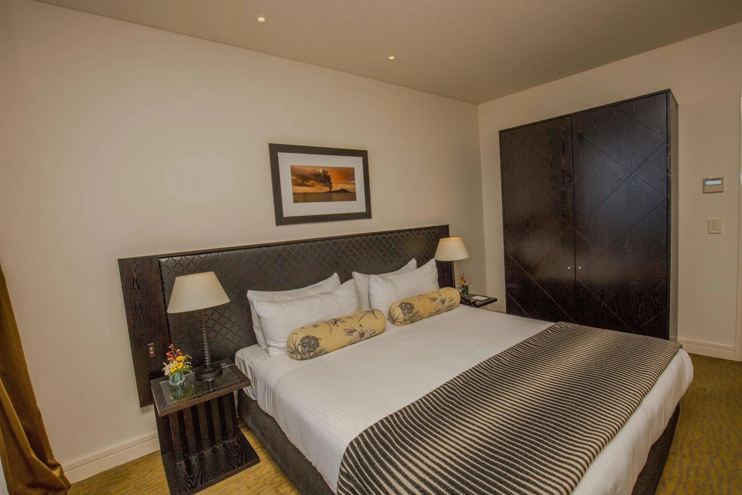 Bed in Grand Papua Hotel, a member of Radisson Individuals