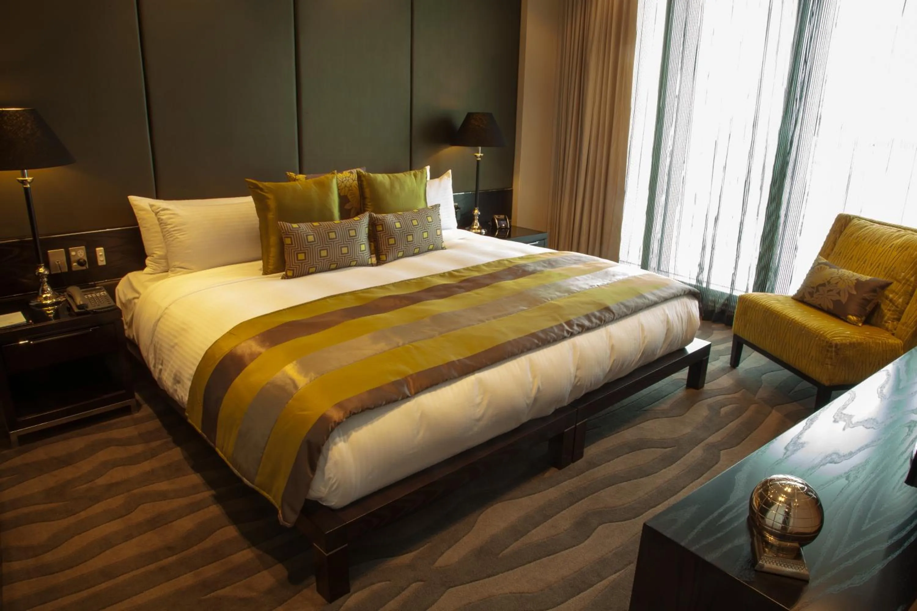 Bed in Grand Papua Hotel