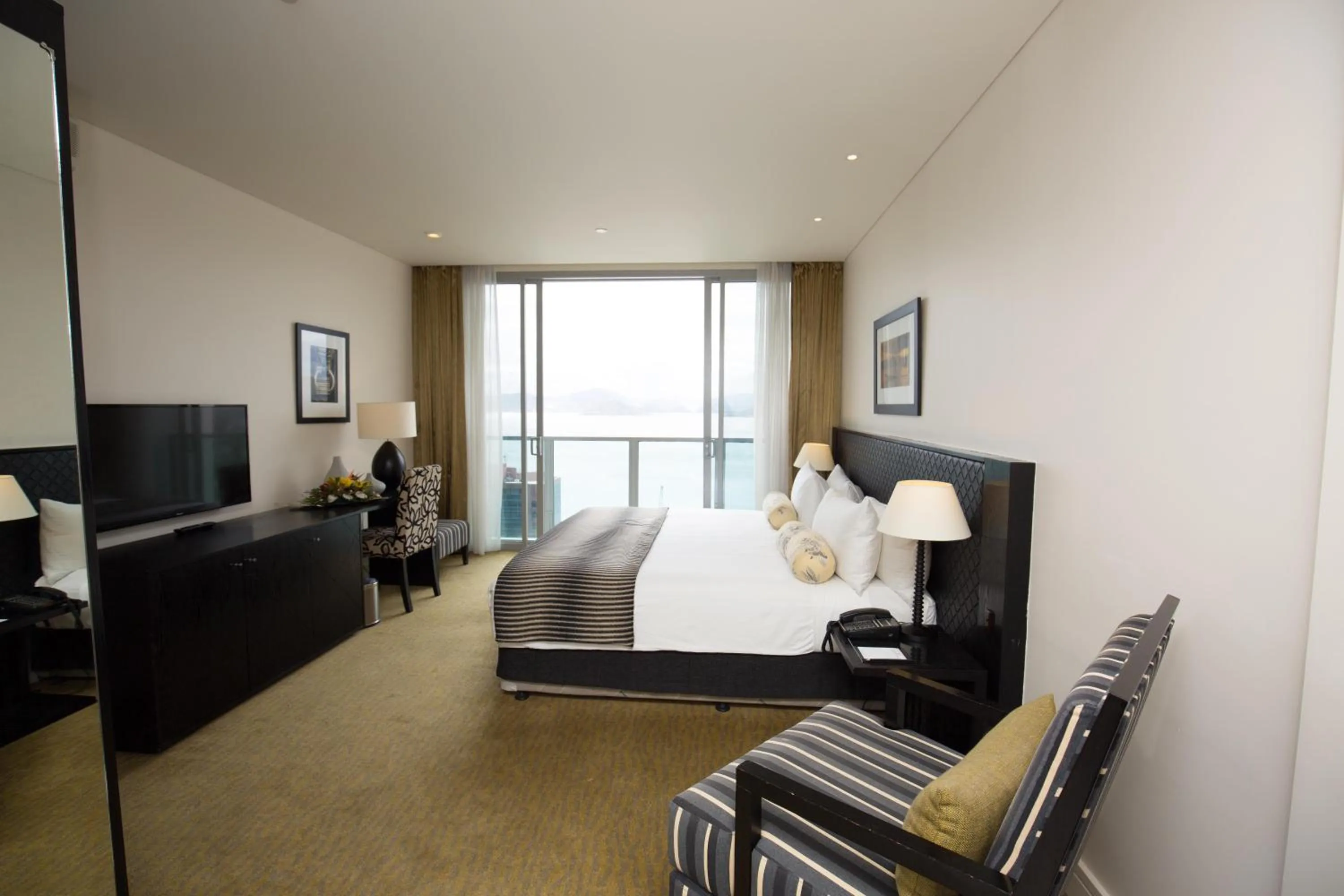 Bed in Grand Papua Hotel