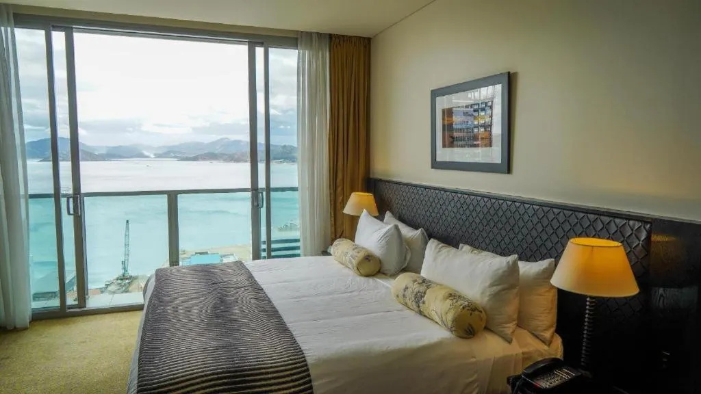 Bed in Grand Papua Hotel