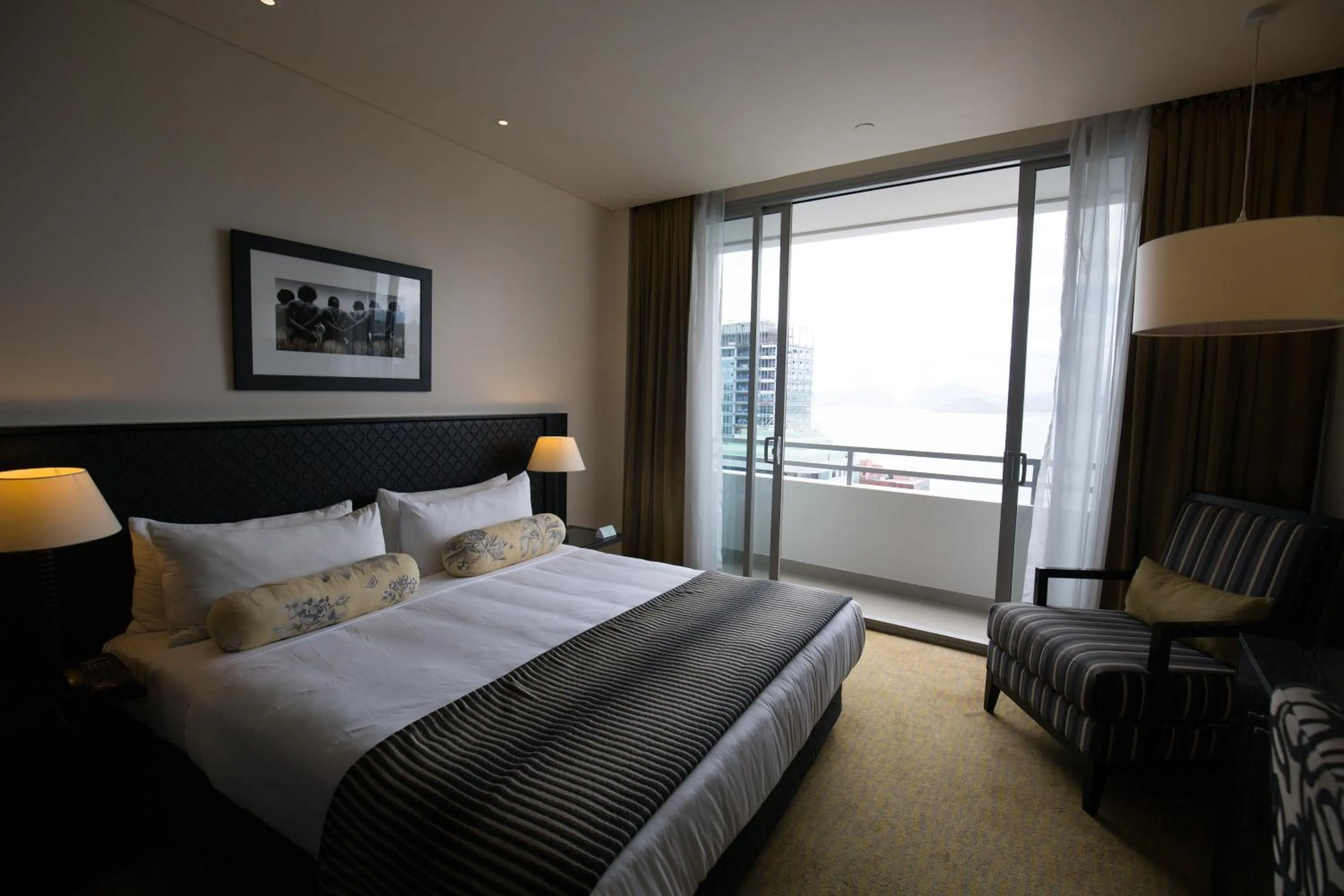 Bed in Grand Papua Hotel